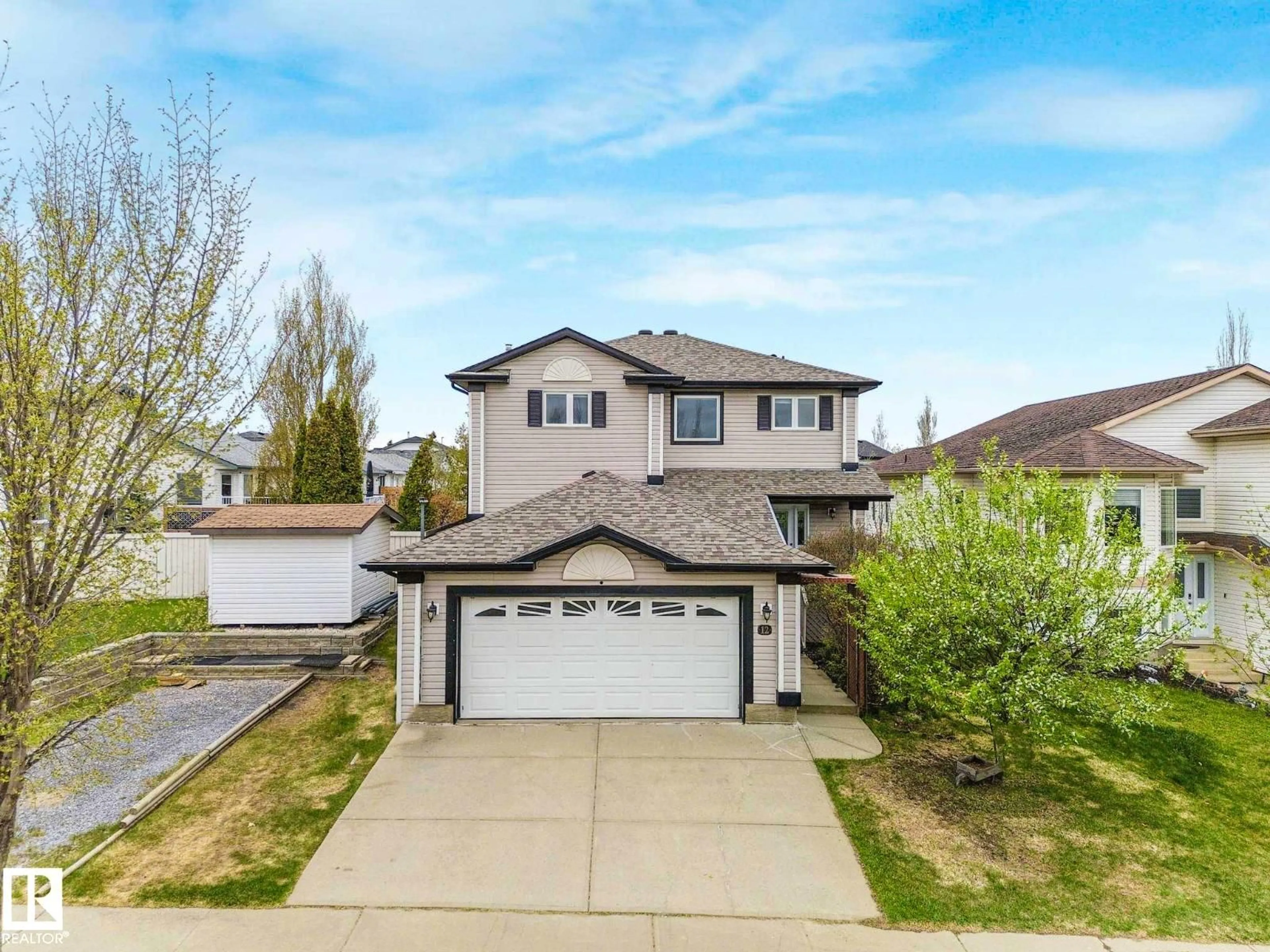 A pic from outside/outdoor area/front of a property/back of a property/a pic from drone, street for 12 RUE BOUCHARD, Beaumont Alberta T4X1N5