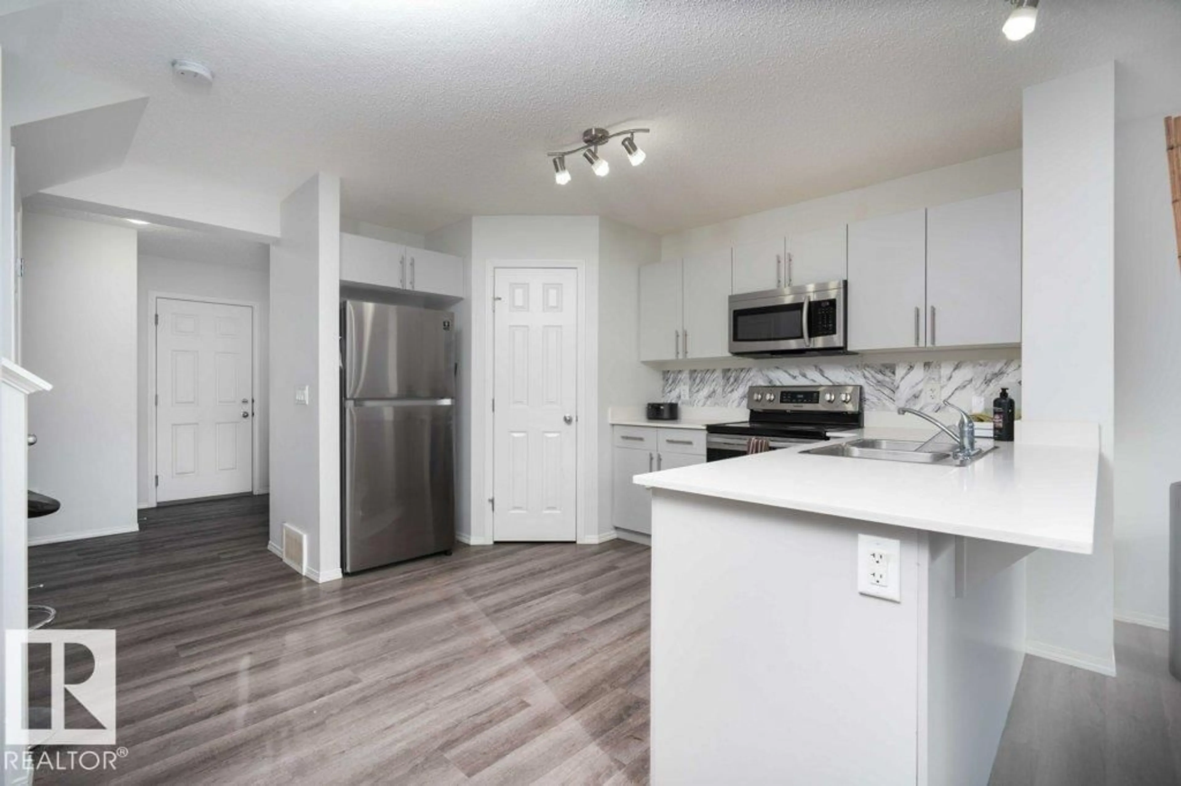 Open concept kitchen, unknown for 3099 CHECKNITA WY, Edmonton Alberta T6W4E9