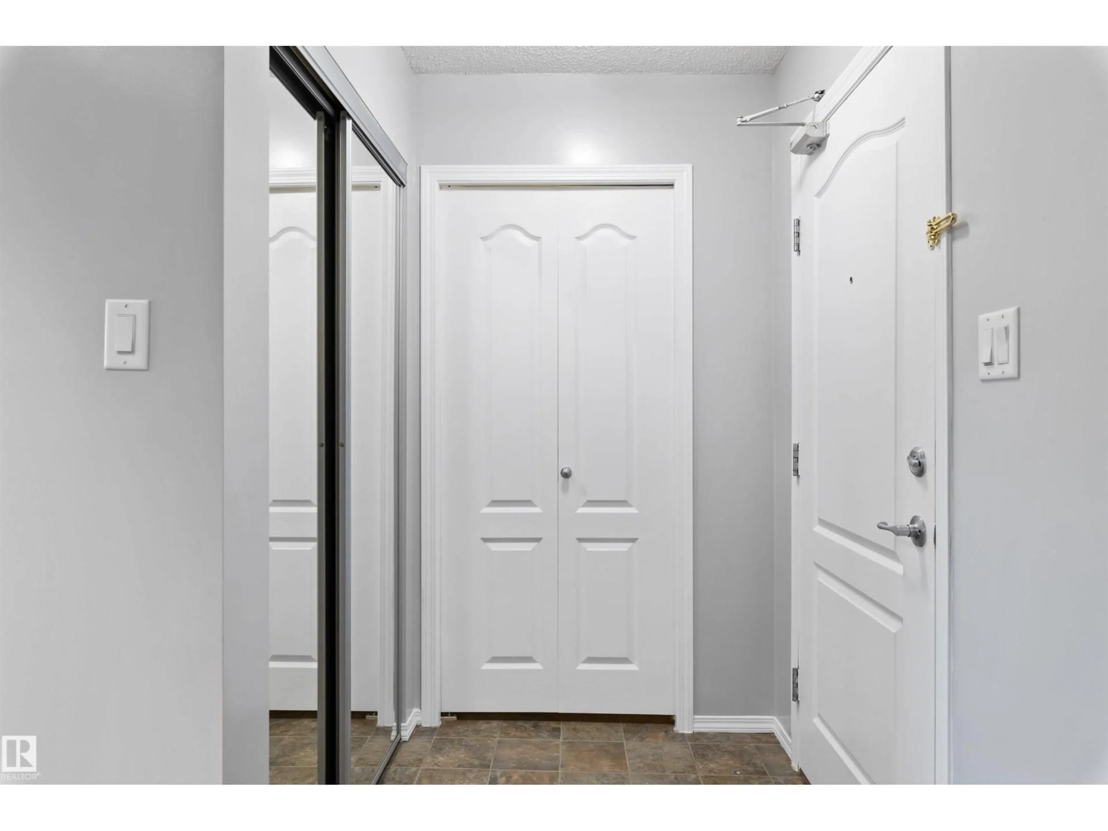 Indoor entryway for 111 5951 165 AV NW, Edmonton Alberta T5Y0J6