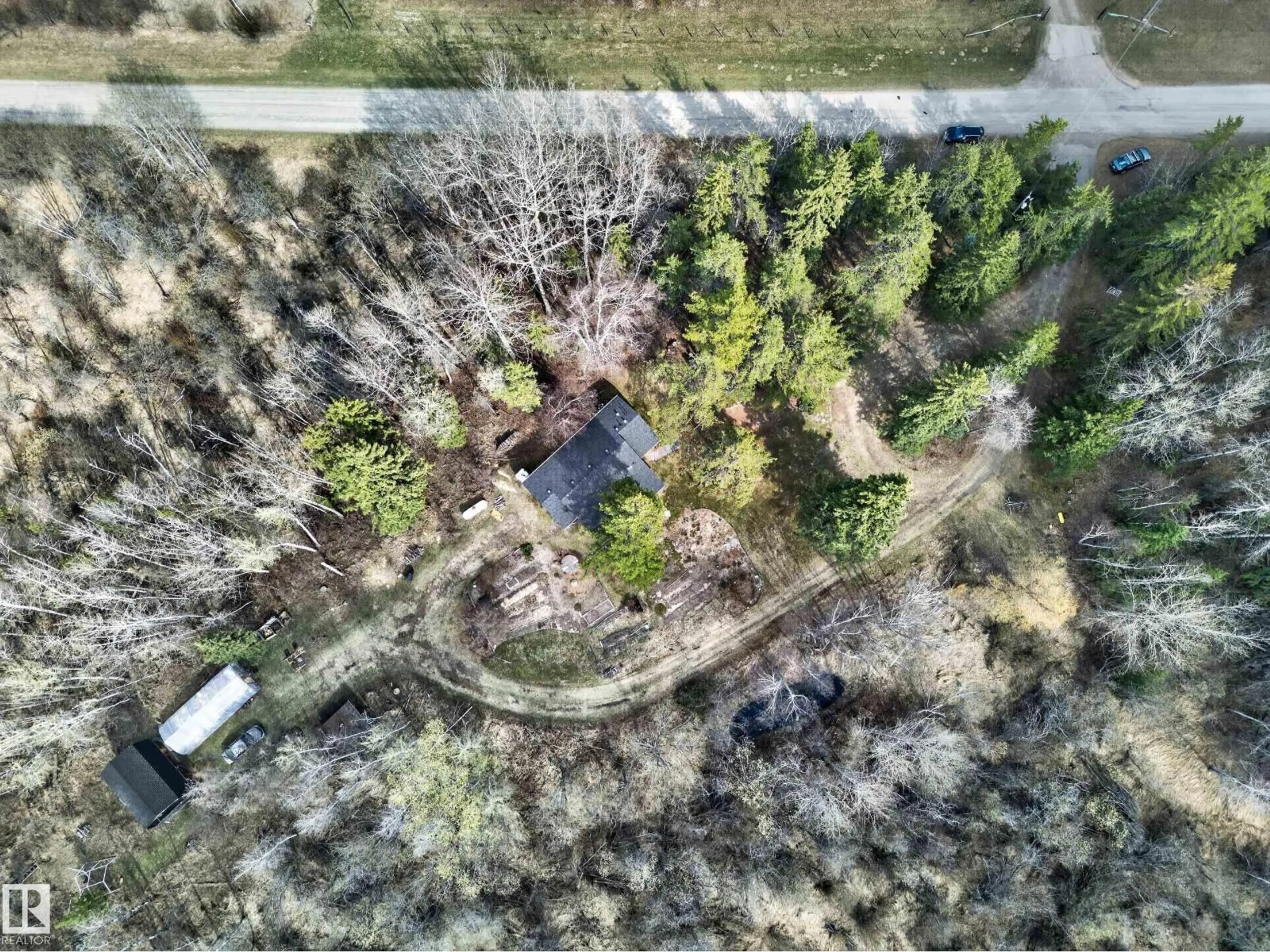 A pic from outside/outdoor area/front of a property/back of a property/a pic from drone, forest/trees view for 51226 RGE ROAD 270, Rural Parkland County Alberta T7Y1G7