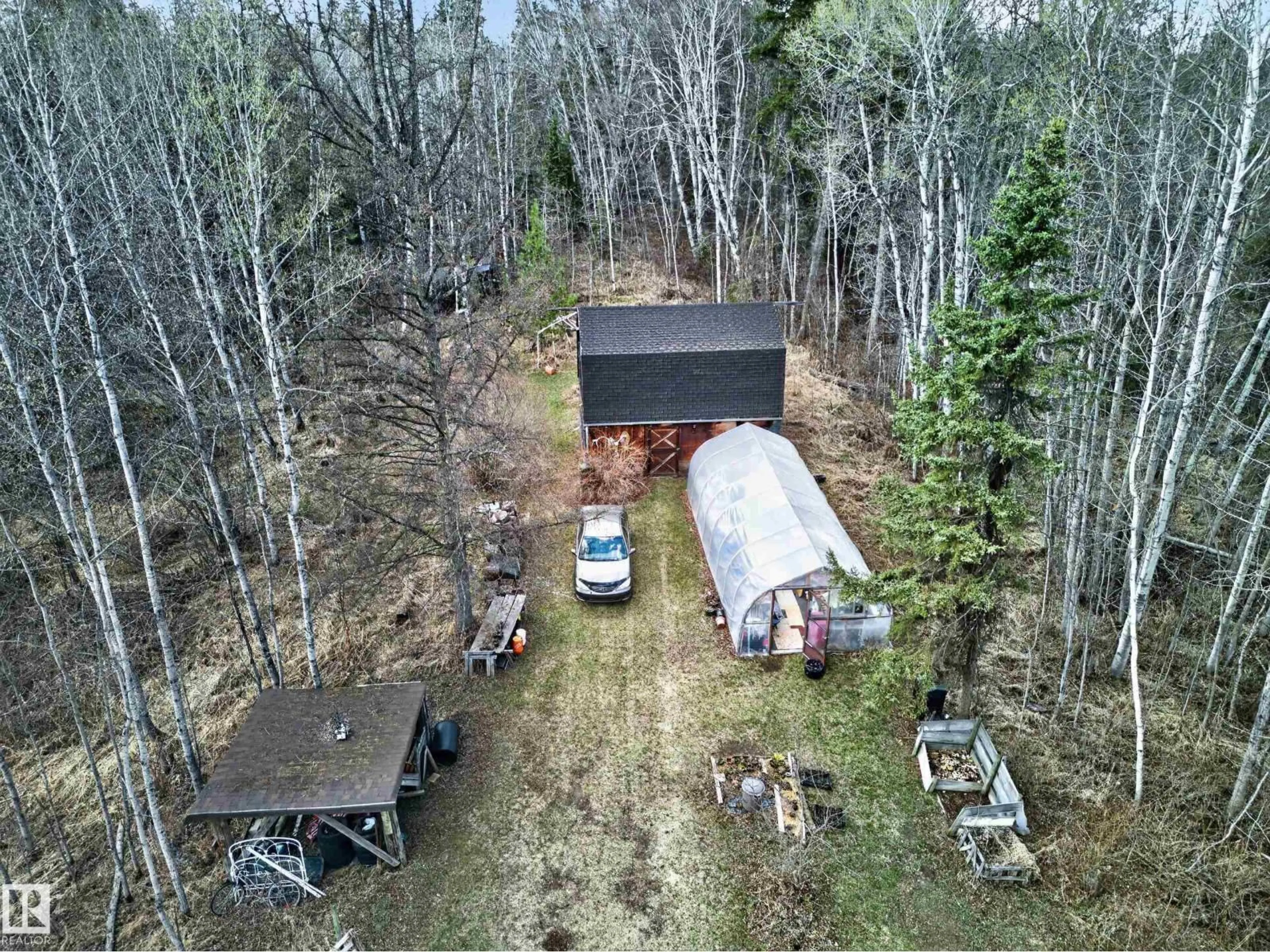 A pic from outside/outdoor area/front of a property/back of a property/a pic from drone, forest/trees view for 51226 RGE ROAD 270, Rural Parkland County Alberta T7Y1G7