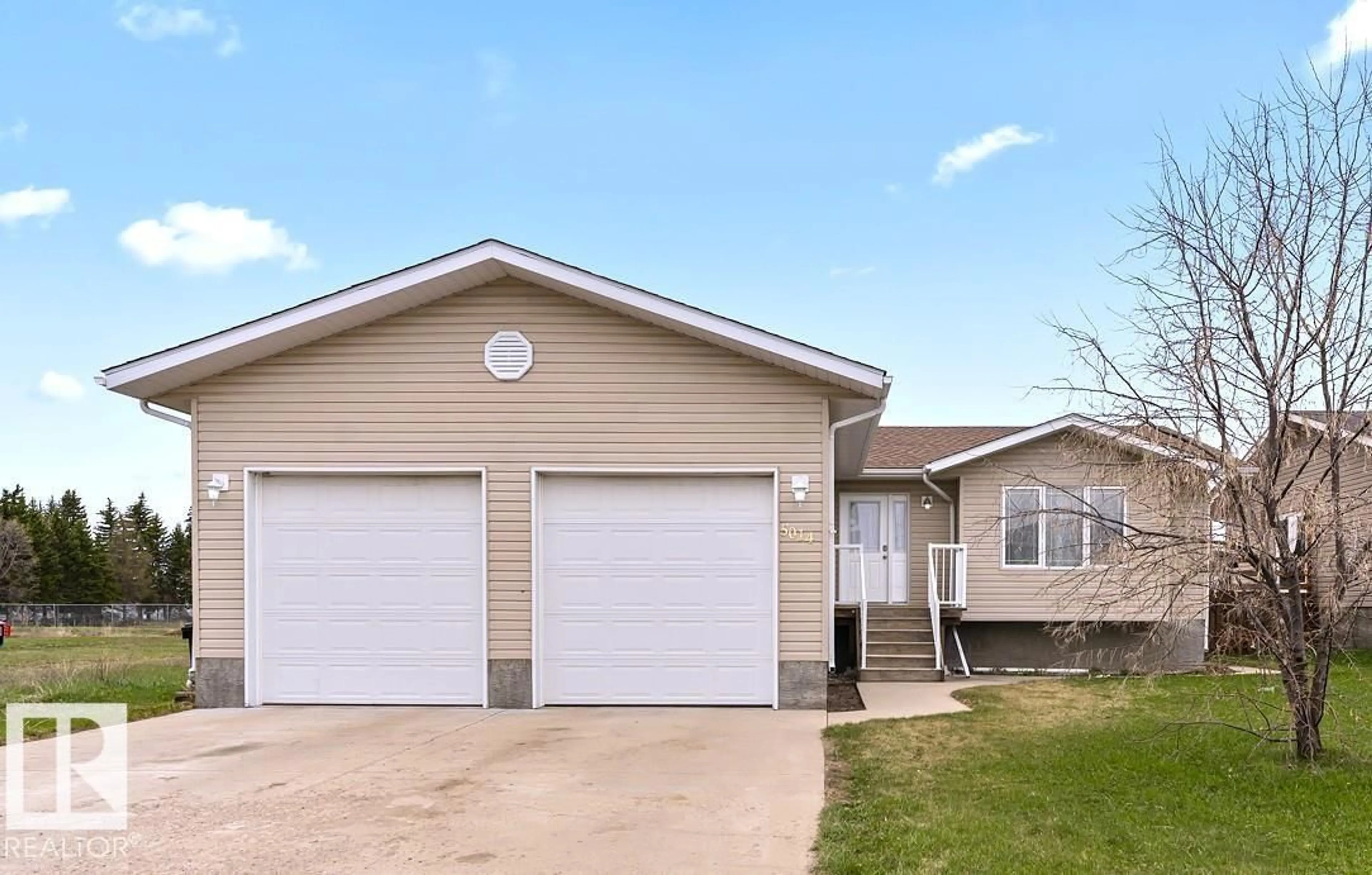 Home with vinyl exterior material, street for 5014 49 ST, Fort Kent Alberta T0H1H0