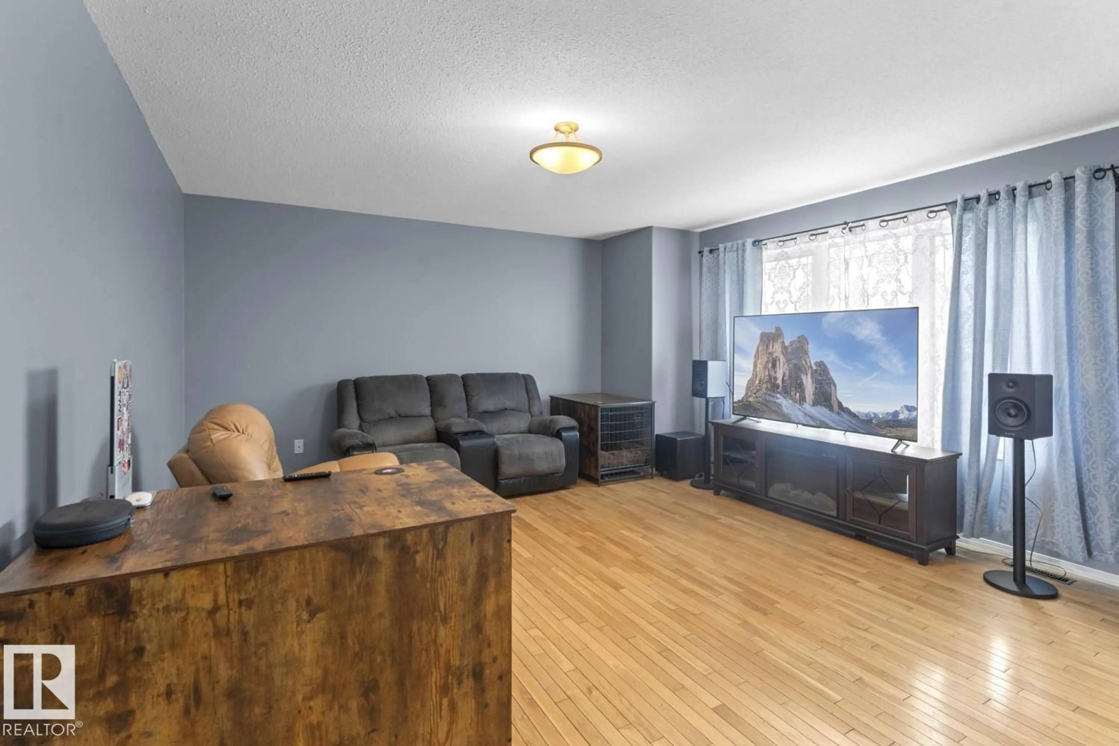 Living room with furniture, wood/laminate floor for 5014 49 ST, Fort Kent Alberta T0H1H0