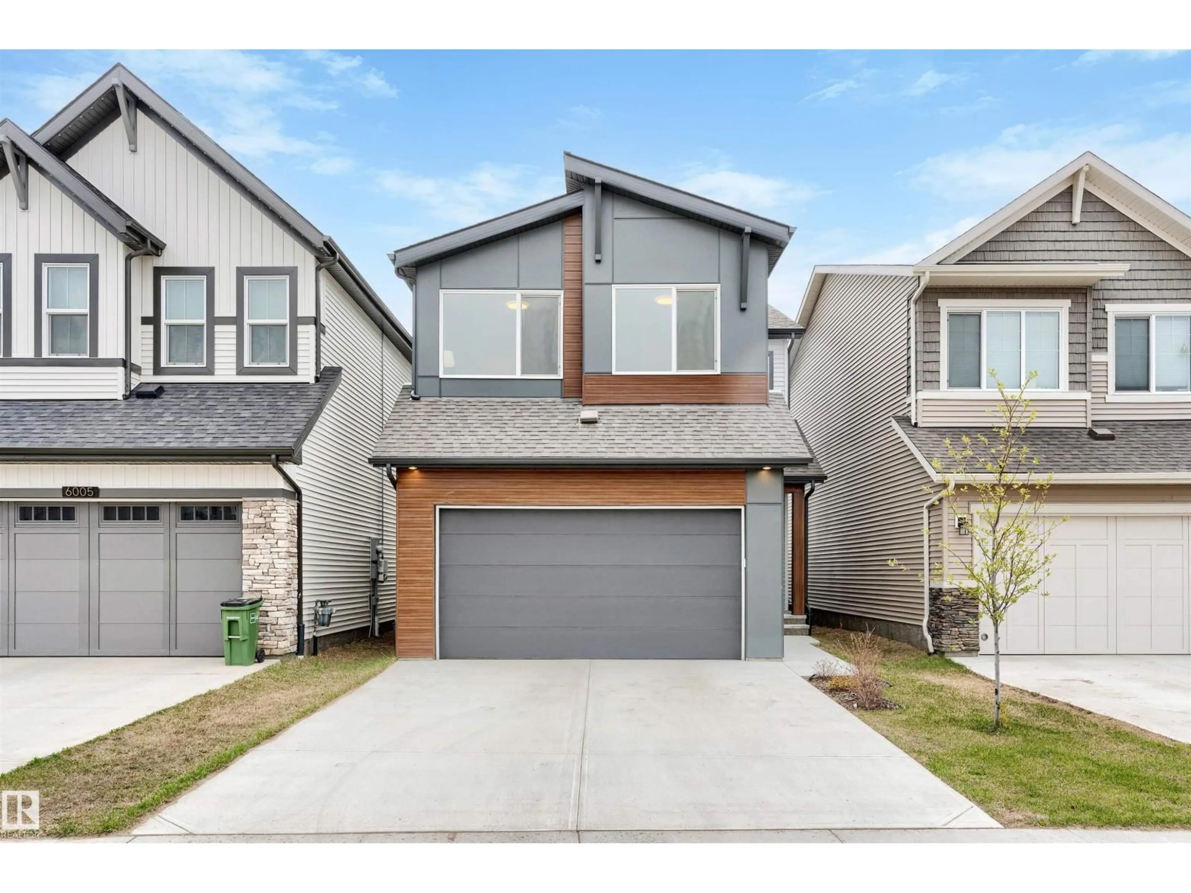 Home with vinyl exterior material, street for 6003 EDMONDS PL, Edmonton Alberta T6M1S1