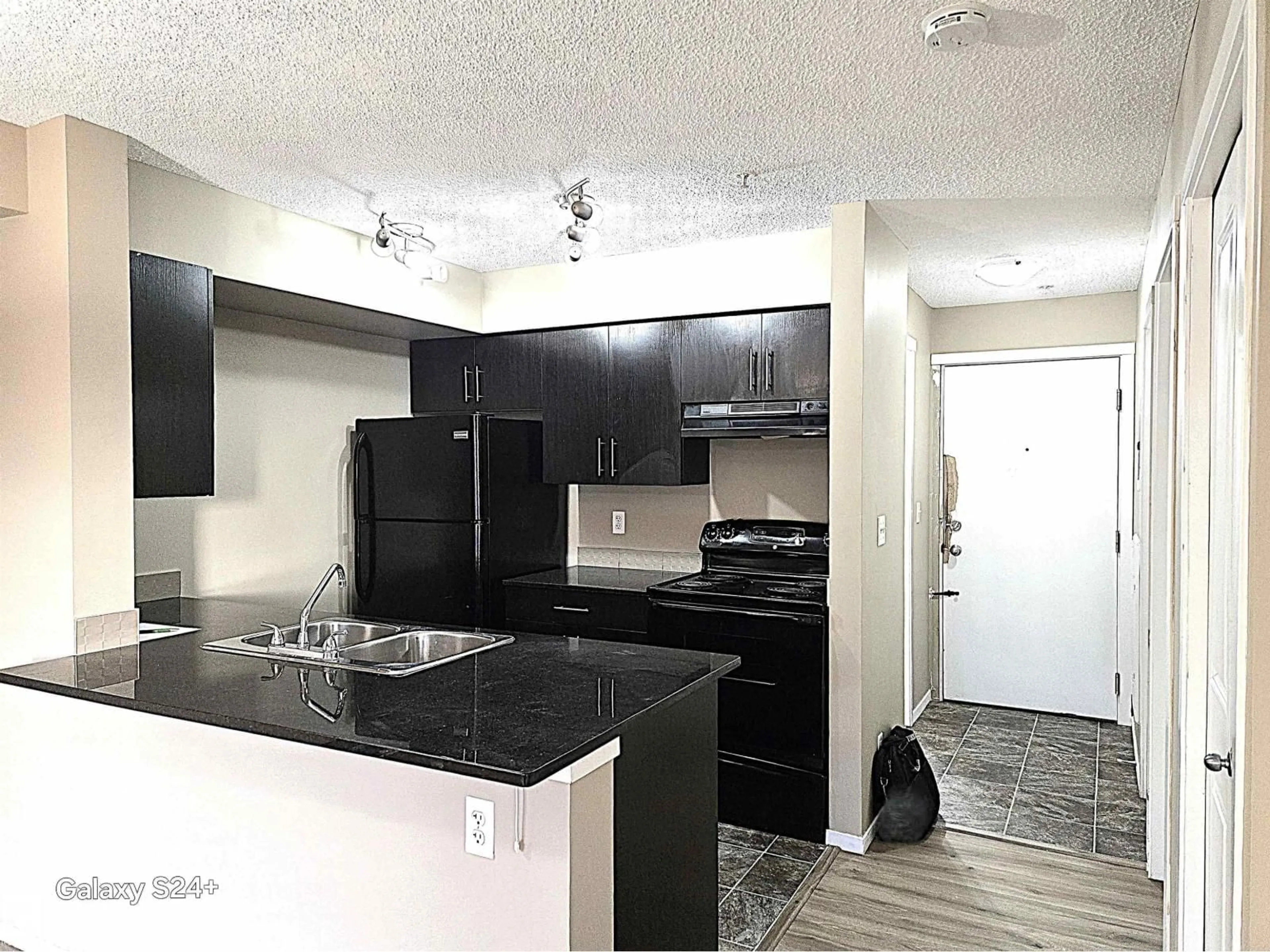 Standard kitchen, unknown for #206 - 3207 JAMES MOWATT TR, Edmonton Alberta T6W3L6