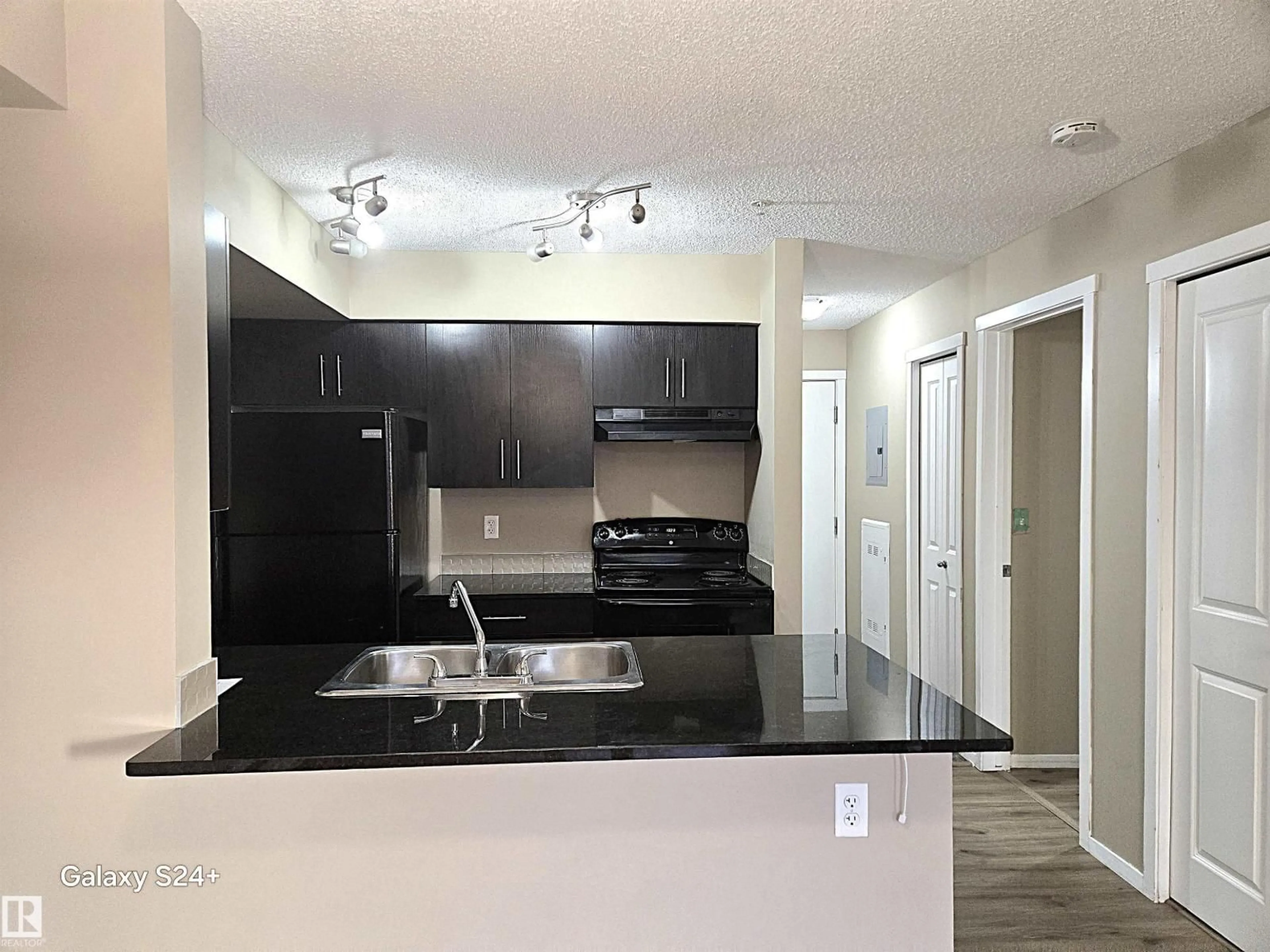 Open concept kitchen, unknown for #206 - 3207 JAMES MOWATT TR, Edmonton Alberta T6W3L6