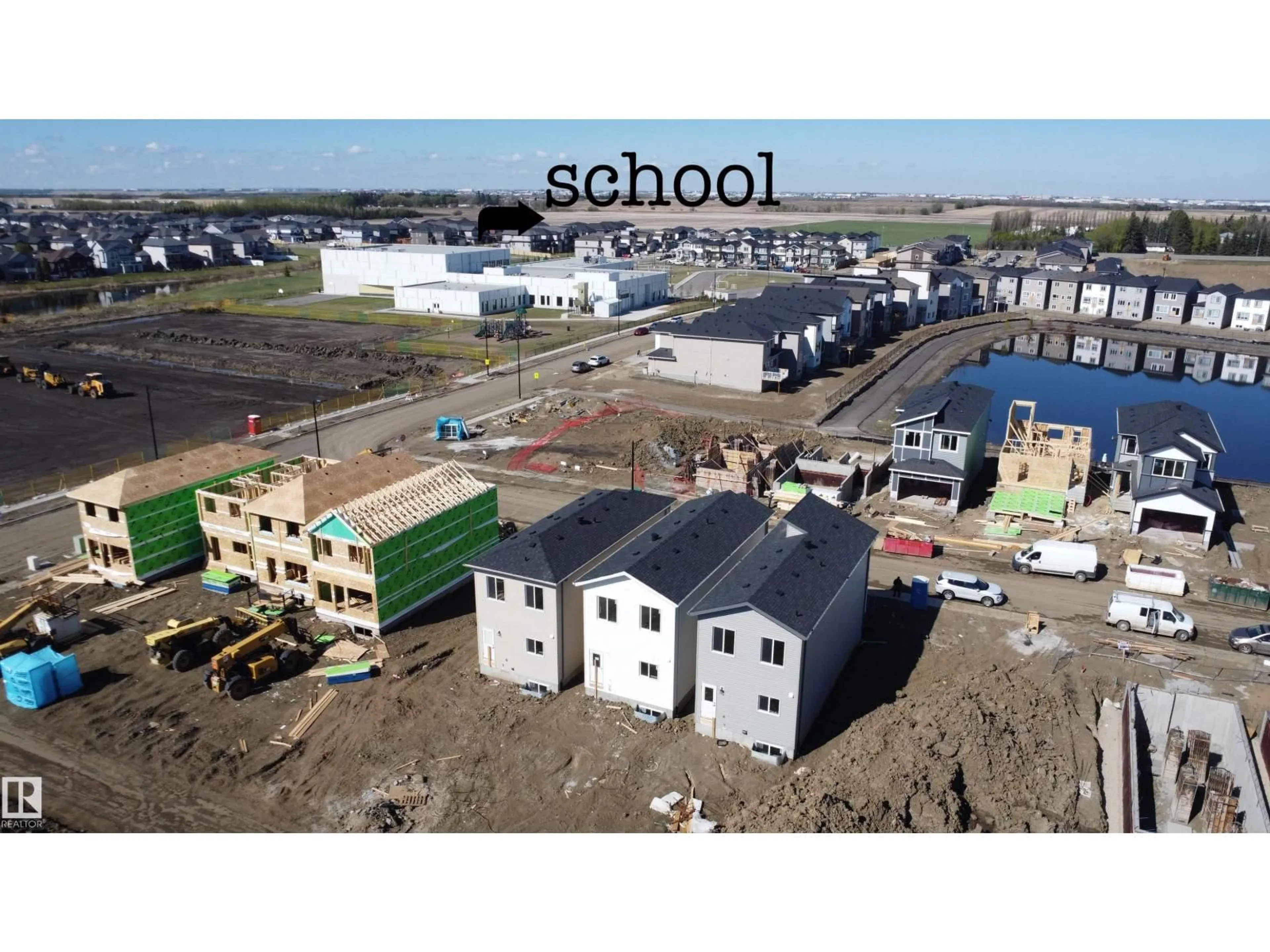 A pic from outside/outdoor area/front of a property/back of a property/a pic from drone, building for 4215 63 ST, Beaumont Alberta T4X3E9