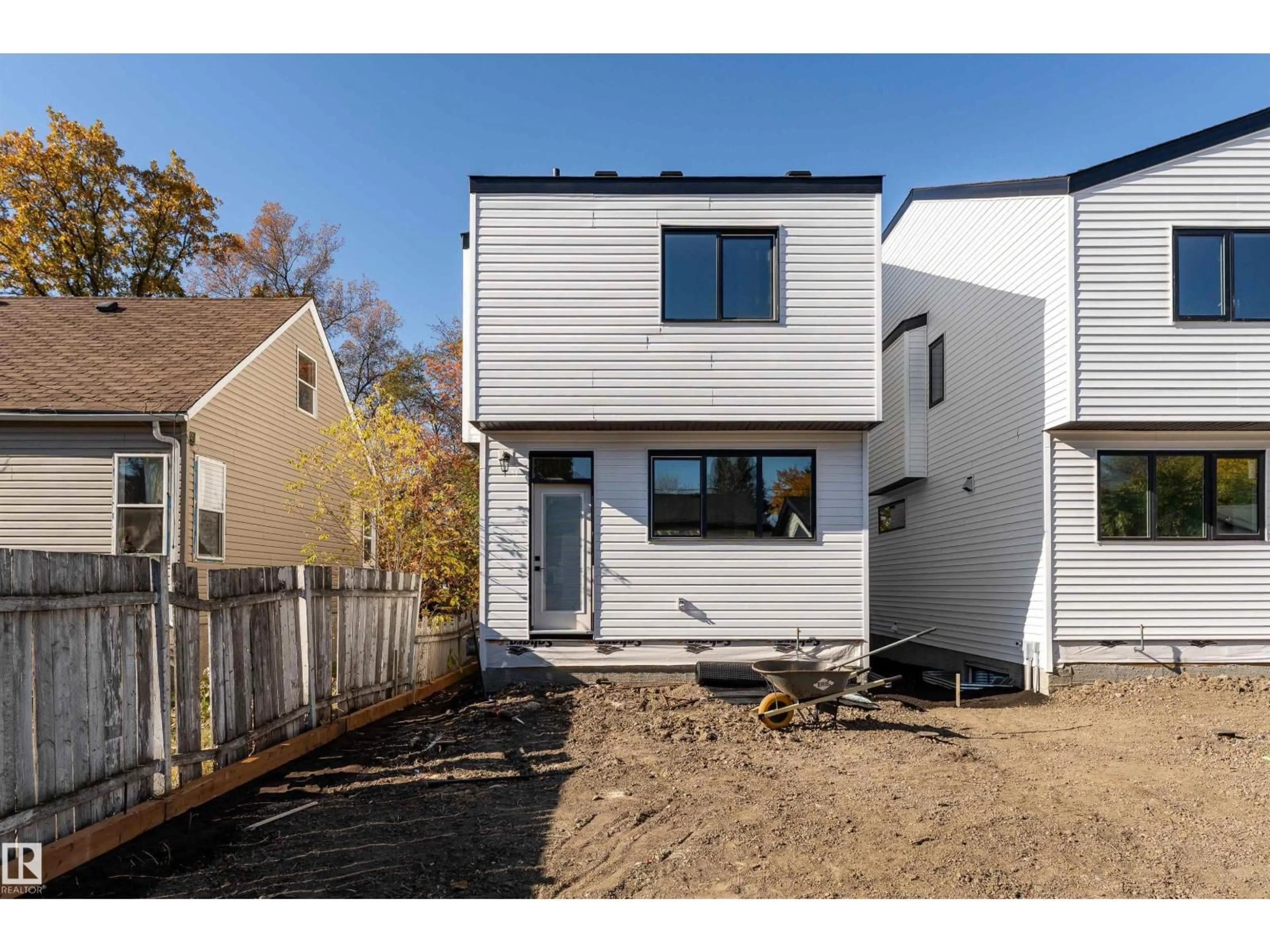 Home with vinyl exterior material, street for NW - 12031 124 ST, Edmonton Alberta T5L0M8