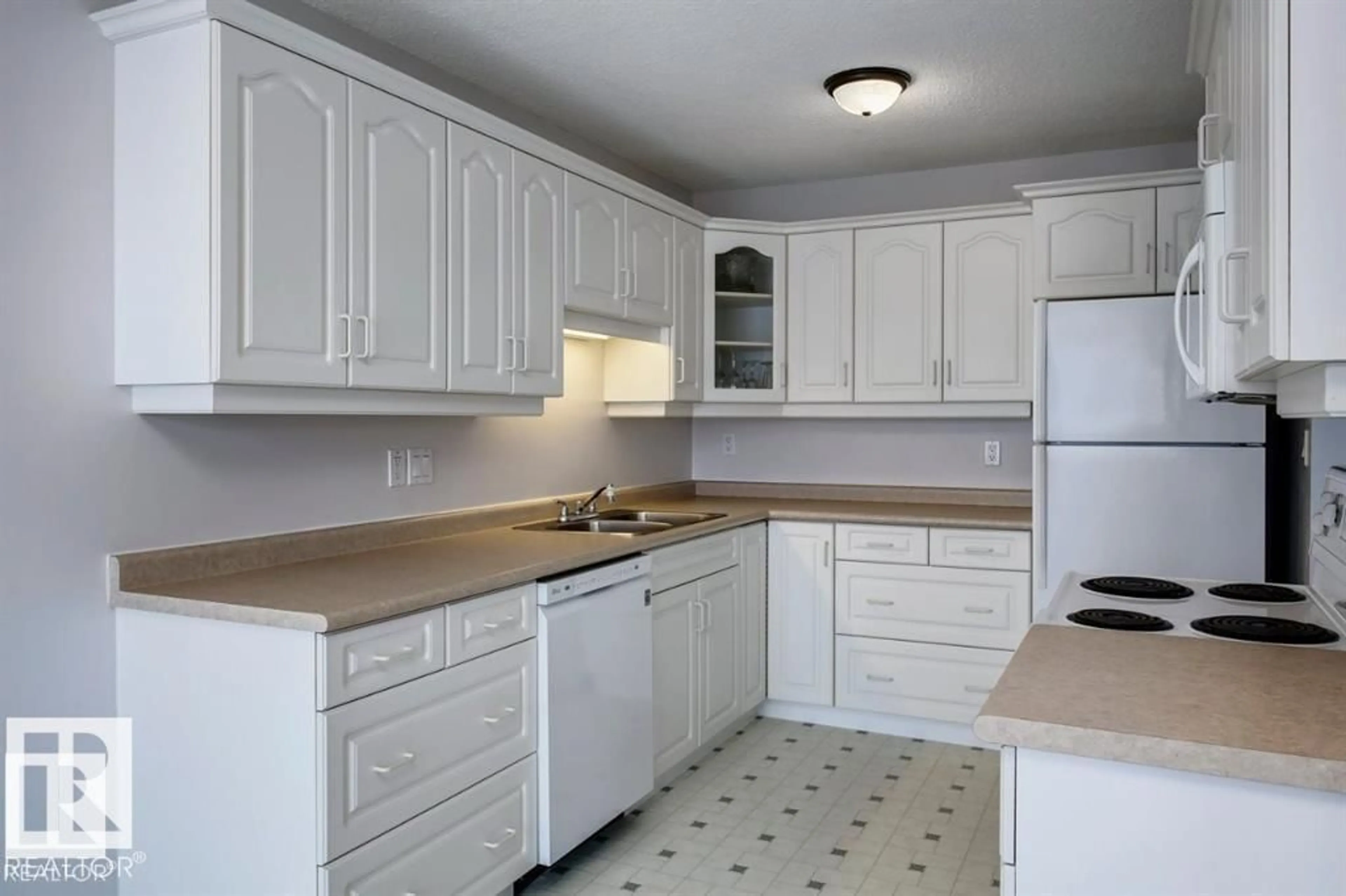 Standard kitchen, unknown for 10688 BEAUMARIS RD, Edmonton Alberta T5X3N4
