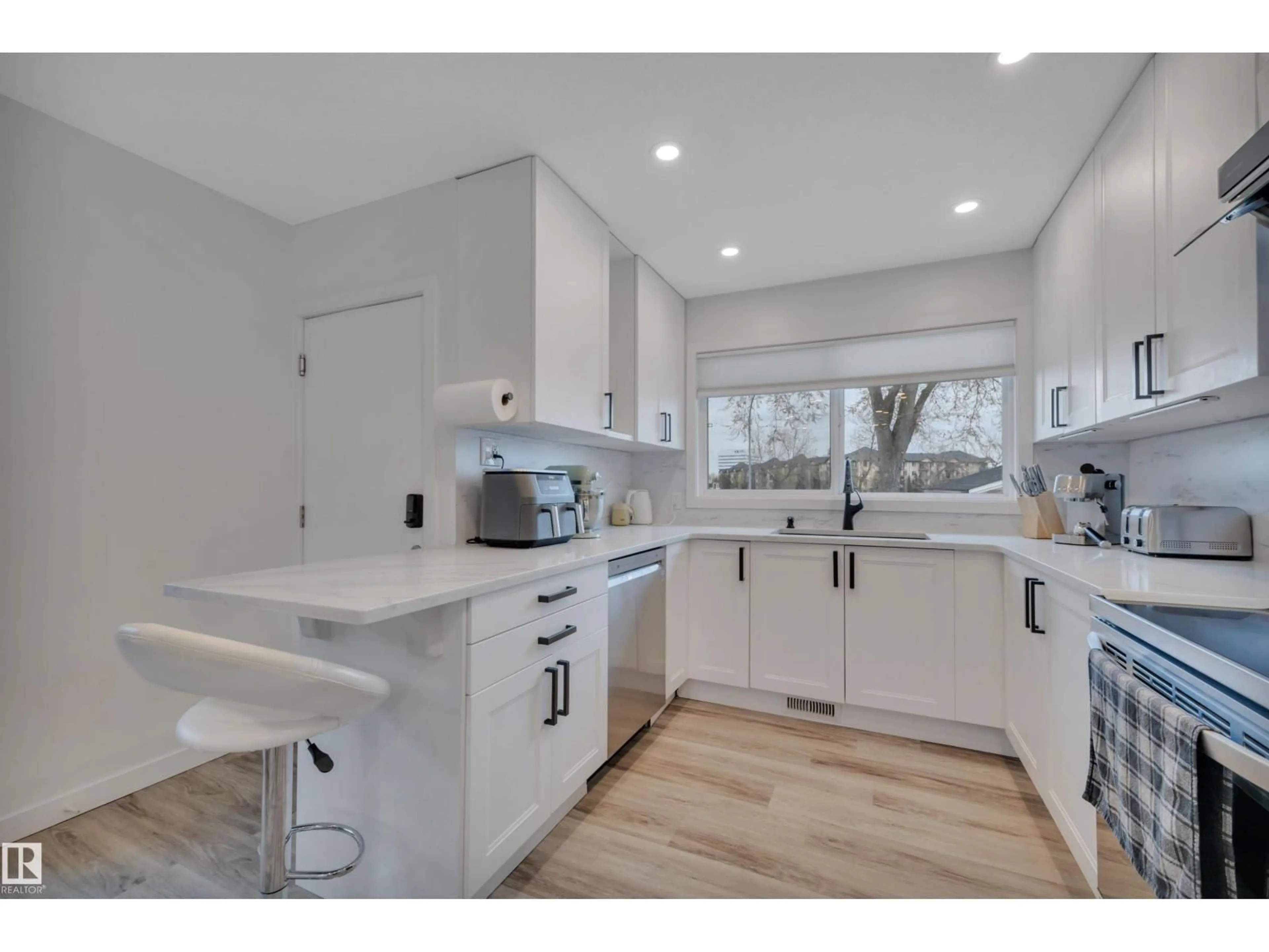 Open concept kitchen, unknown for 6011 107 ST, Edmonton Alberta T6H2X9