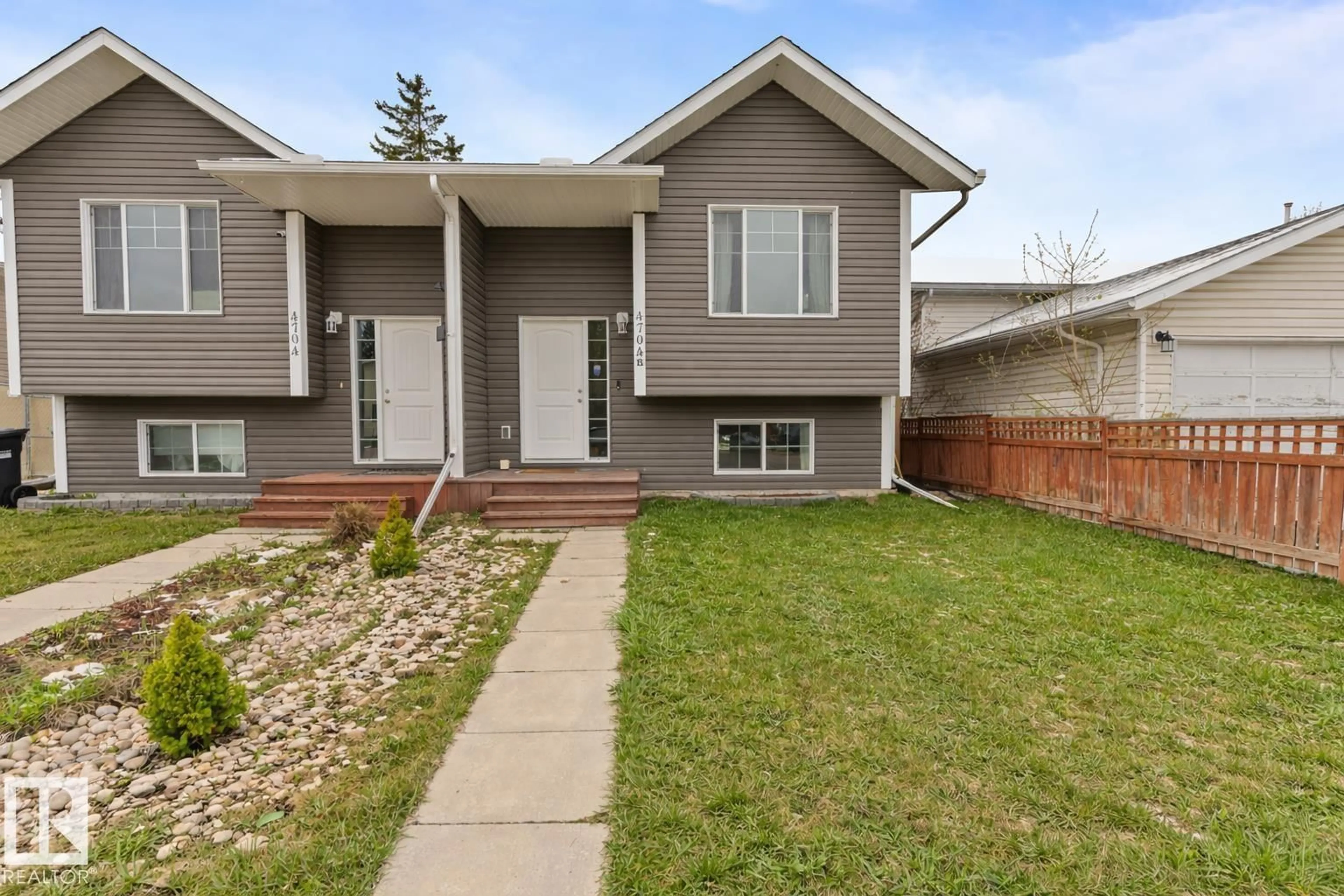 Home with vinyl exterior material, street for 4704B 48 ST, Cold Lake Alberta T9M1Y4
