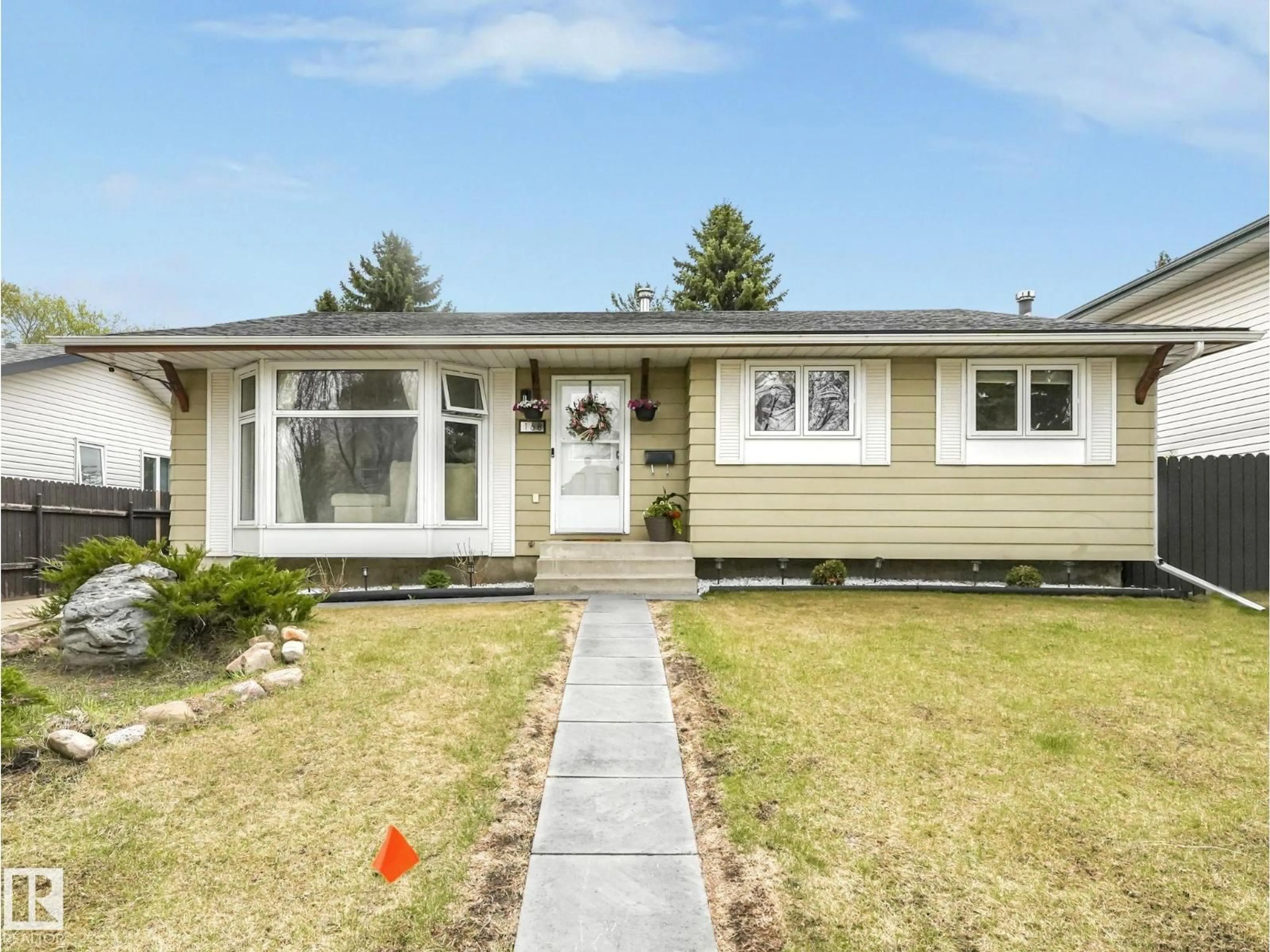 Home with vinyl exterior material, street for 168 HUMBERSTONE RD, Edmonton Alberta T5A4C6
