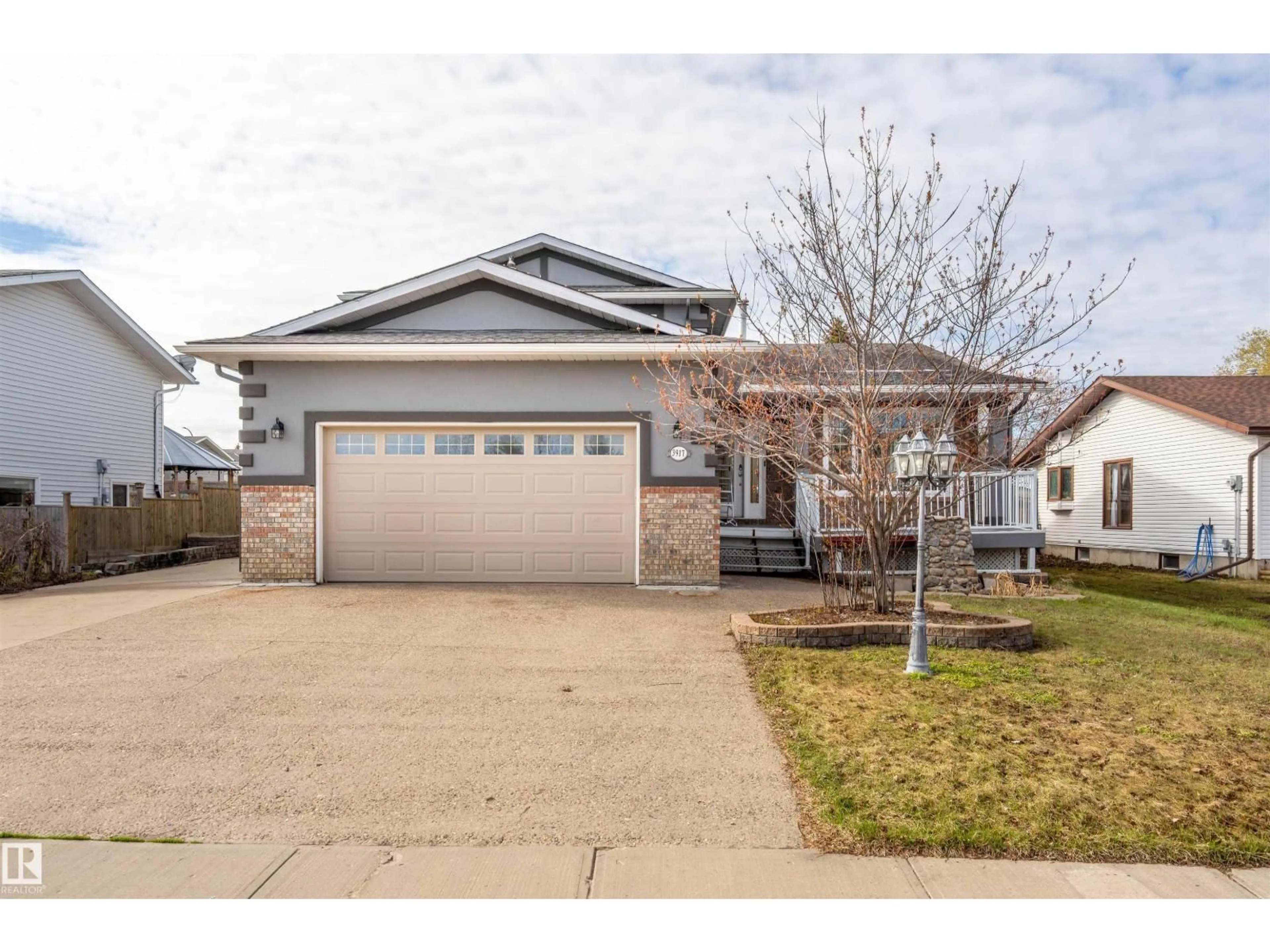 Home with vinyl exterior material, street for 3917 52 AV, Cold Lake Alberta T9M2A7