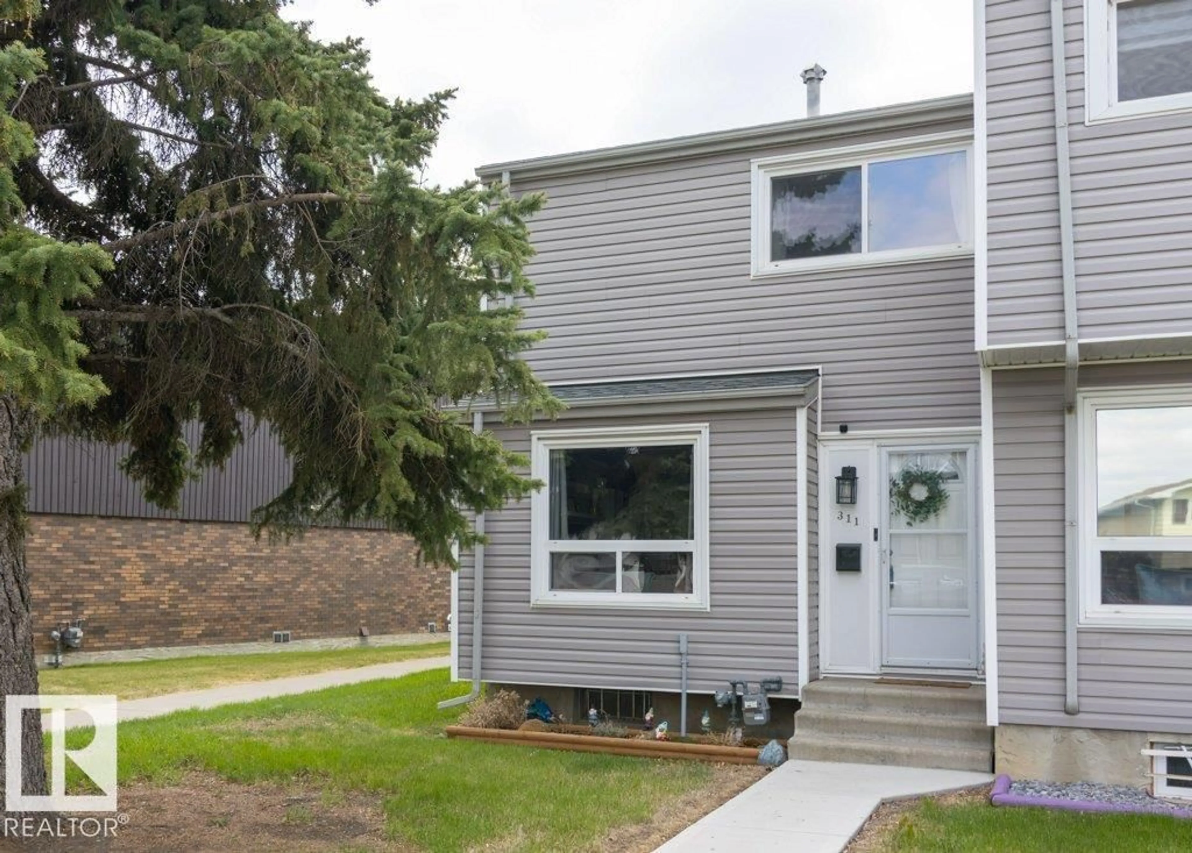 Home with vinyl exterior material, street for 311 NORTHGATE TC, Edmonton Alberta T5E3R3
