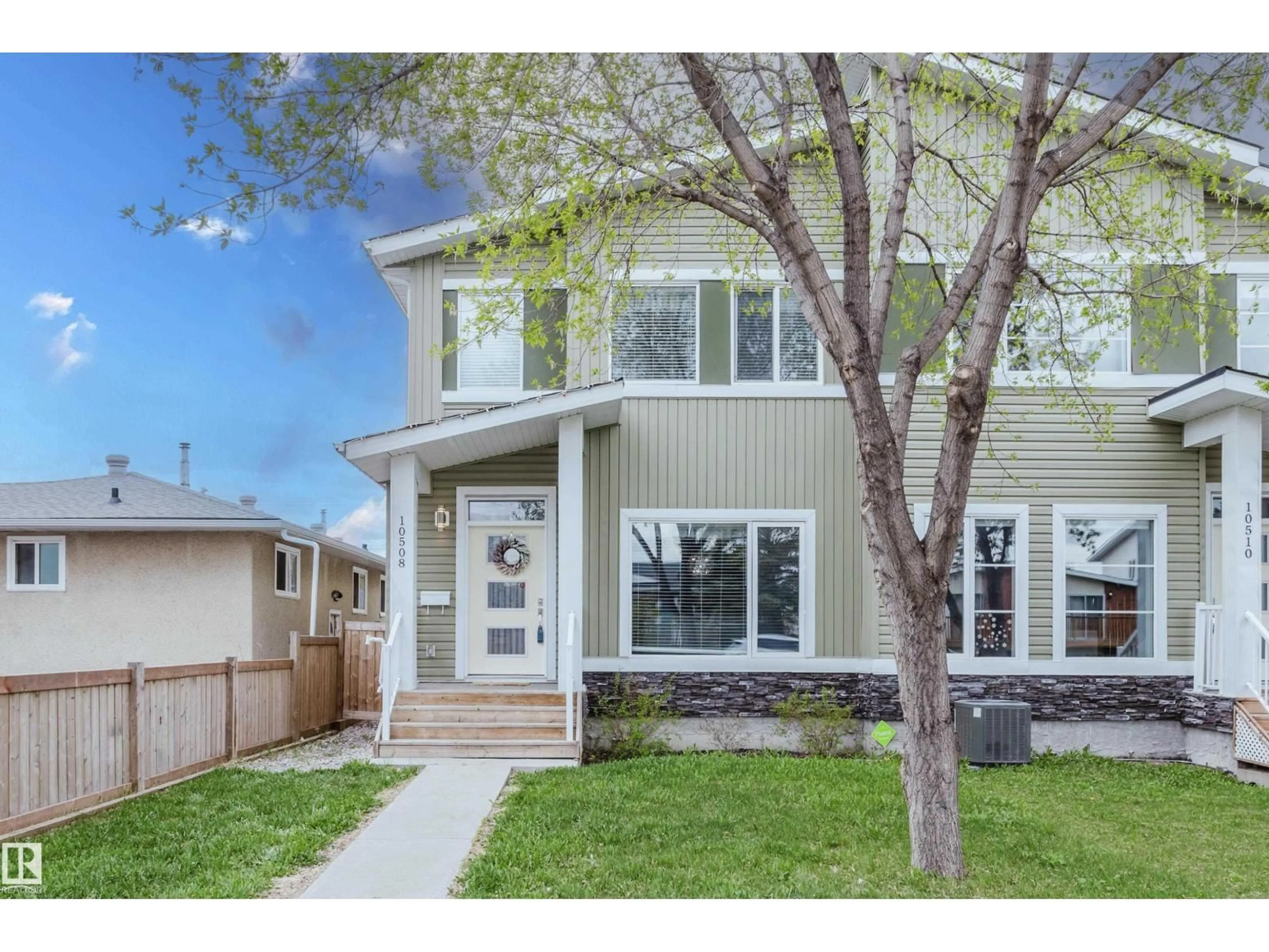 Home with vinyl exterior material, street for 10508 153 ST, Edmonton Alberta T5P2C3