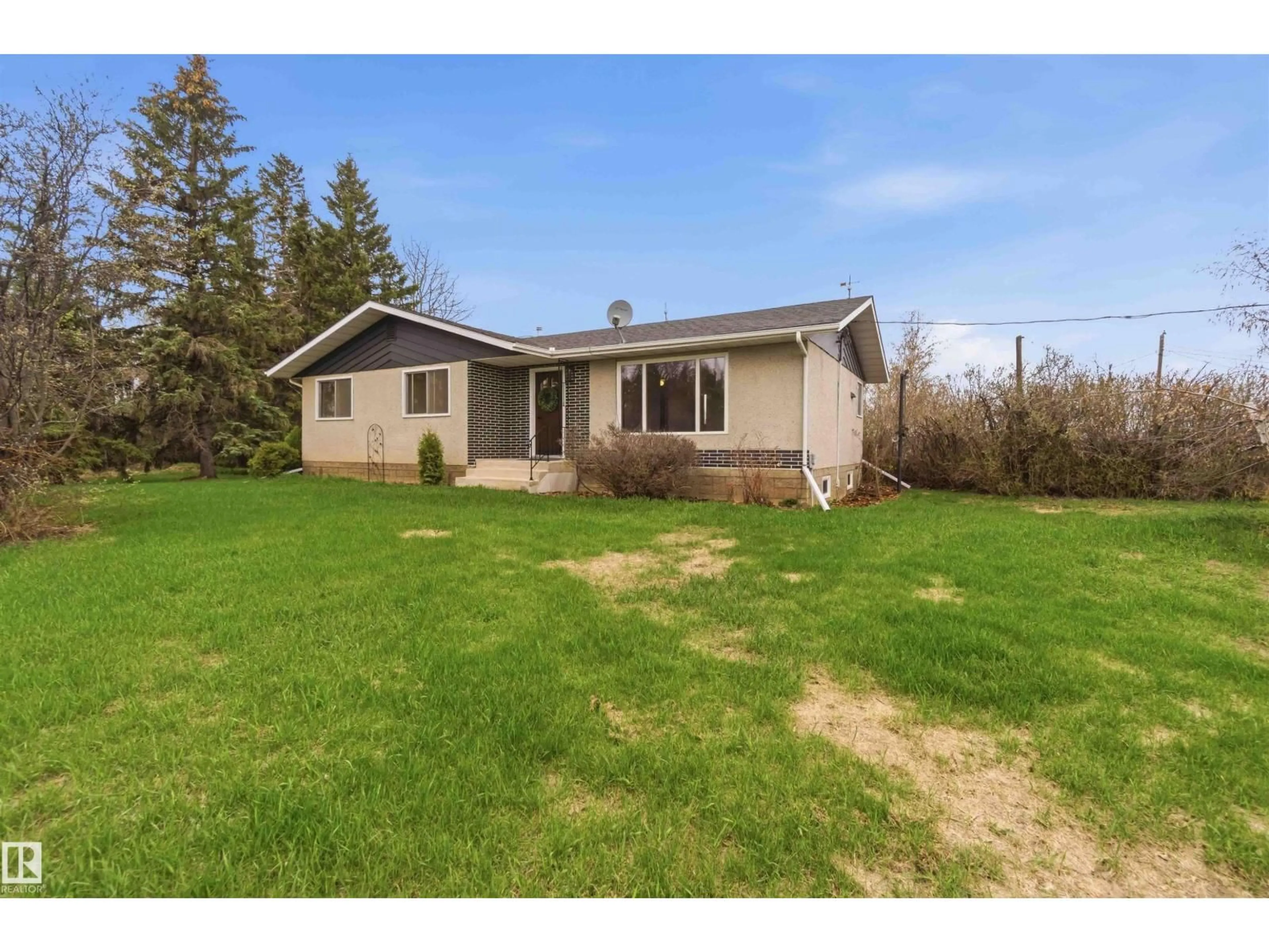A pic from outside/outdoor area/front of a property/back of a property/a pic from drone, unknown for 58201 RR 214, Rural Thorhild County Alberta T0A2W0