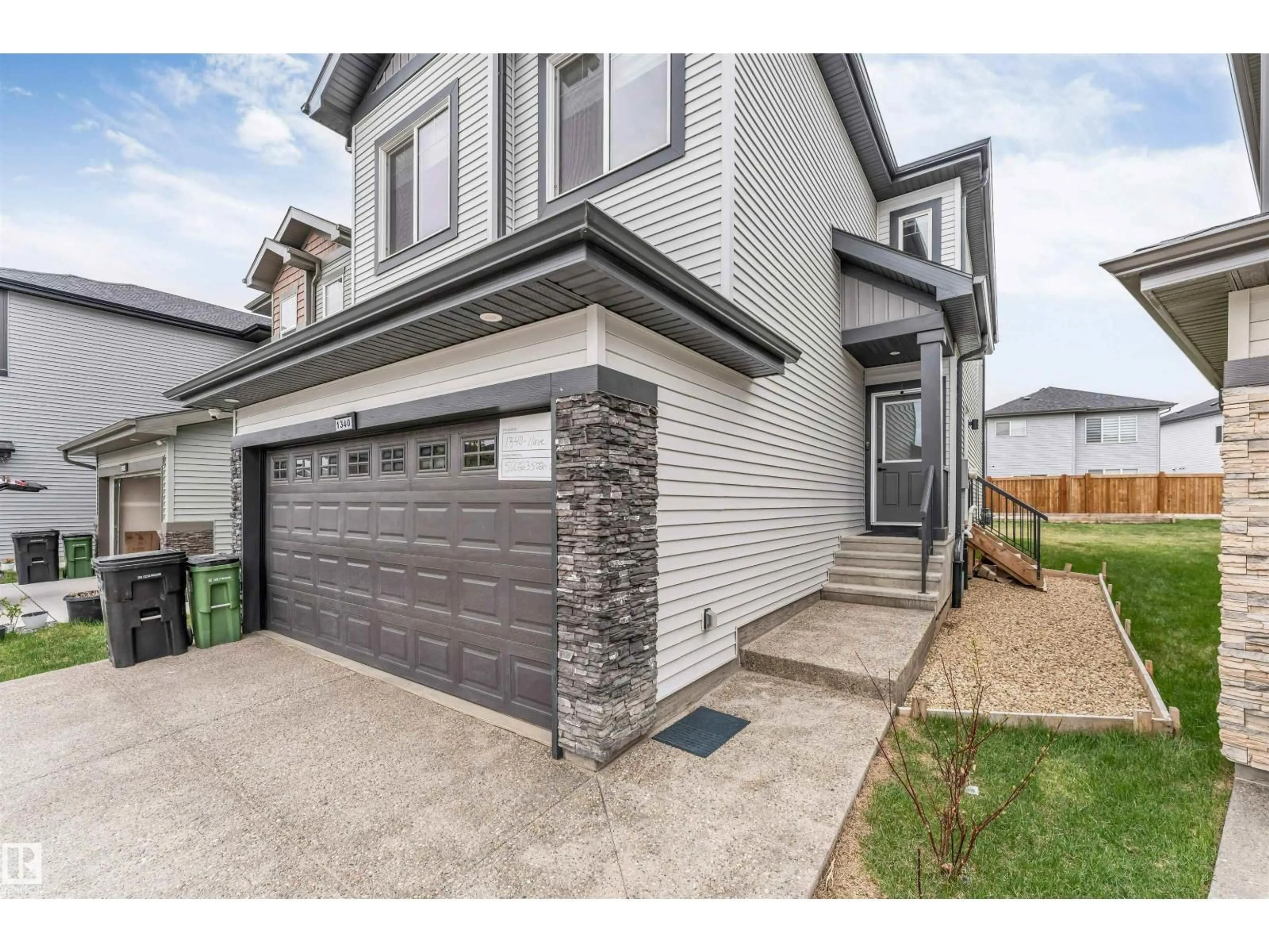 Home with brick exterior material, street for 1340 11 AV, Edmonton Alberta T6T2W4