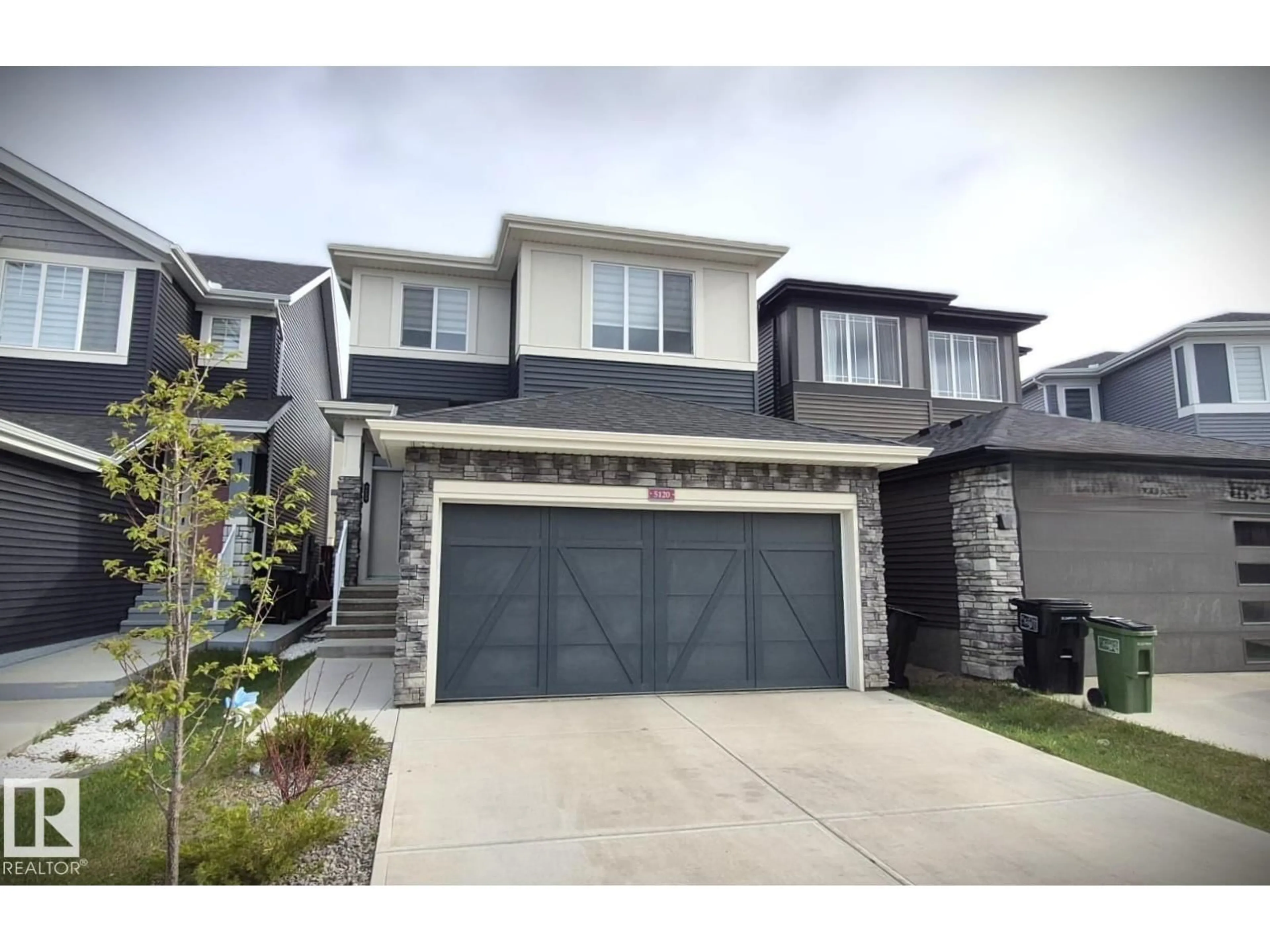 Home with vinyl exterior material, street for 5120 23 AV, Edmonton Alberta T6X3A4