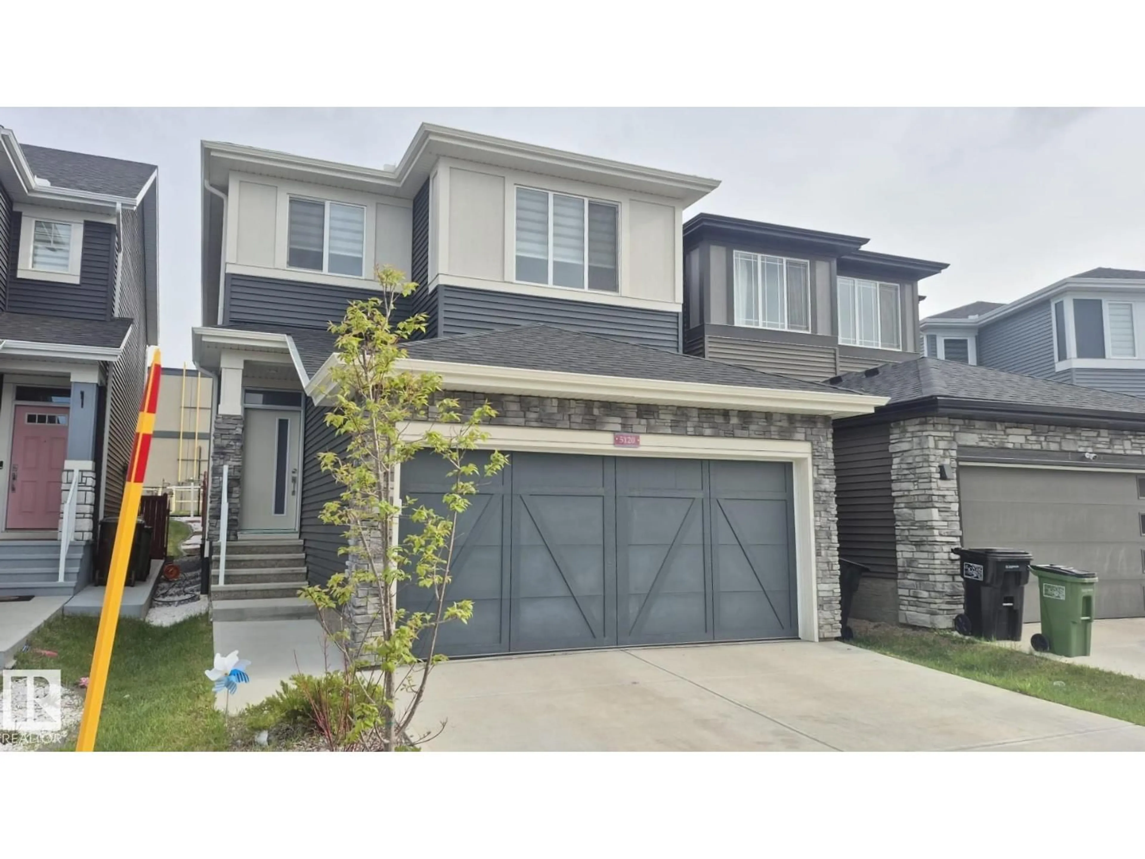Home with vinyl exterior material, street for 5120 23 AV, Edmonton Alberta T6X3A4