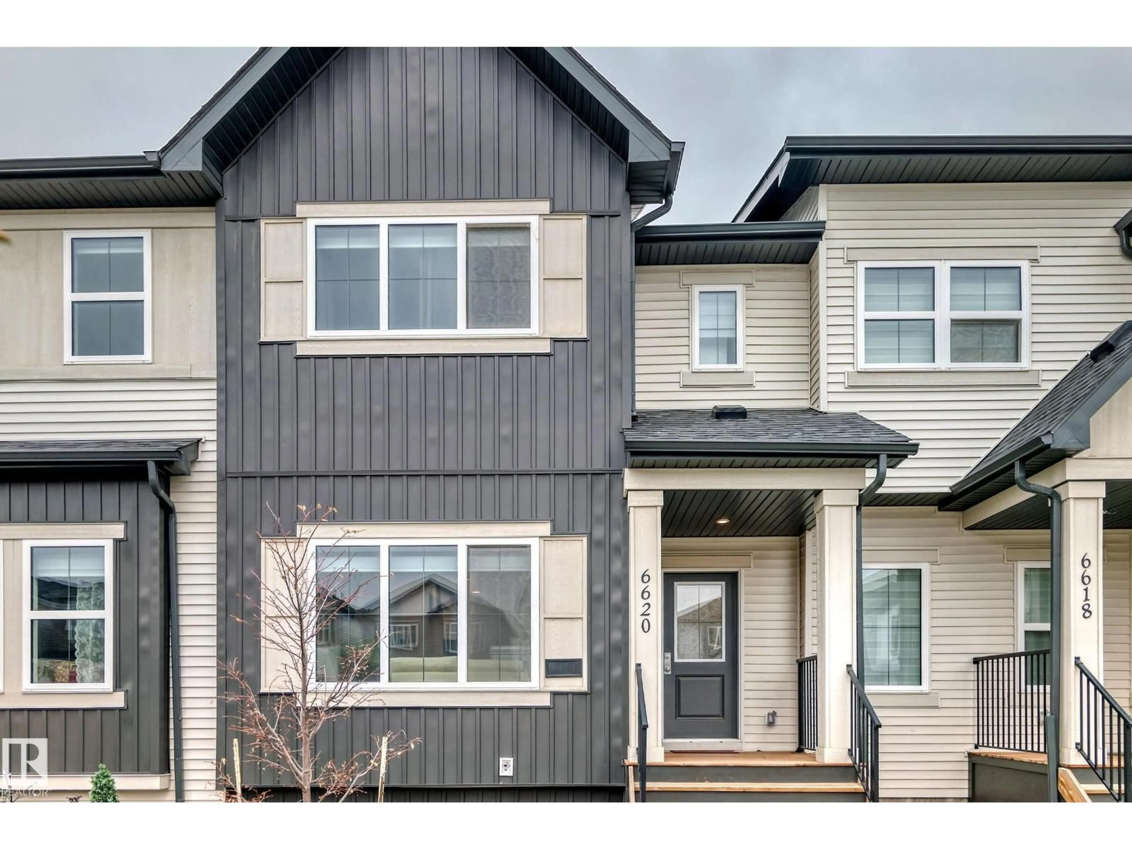 Home with vinyl exterior material, street for 6620 46 AV, Beaumont Alberta T4X2Z4