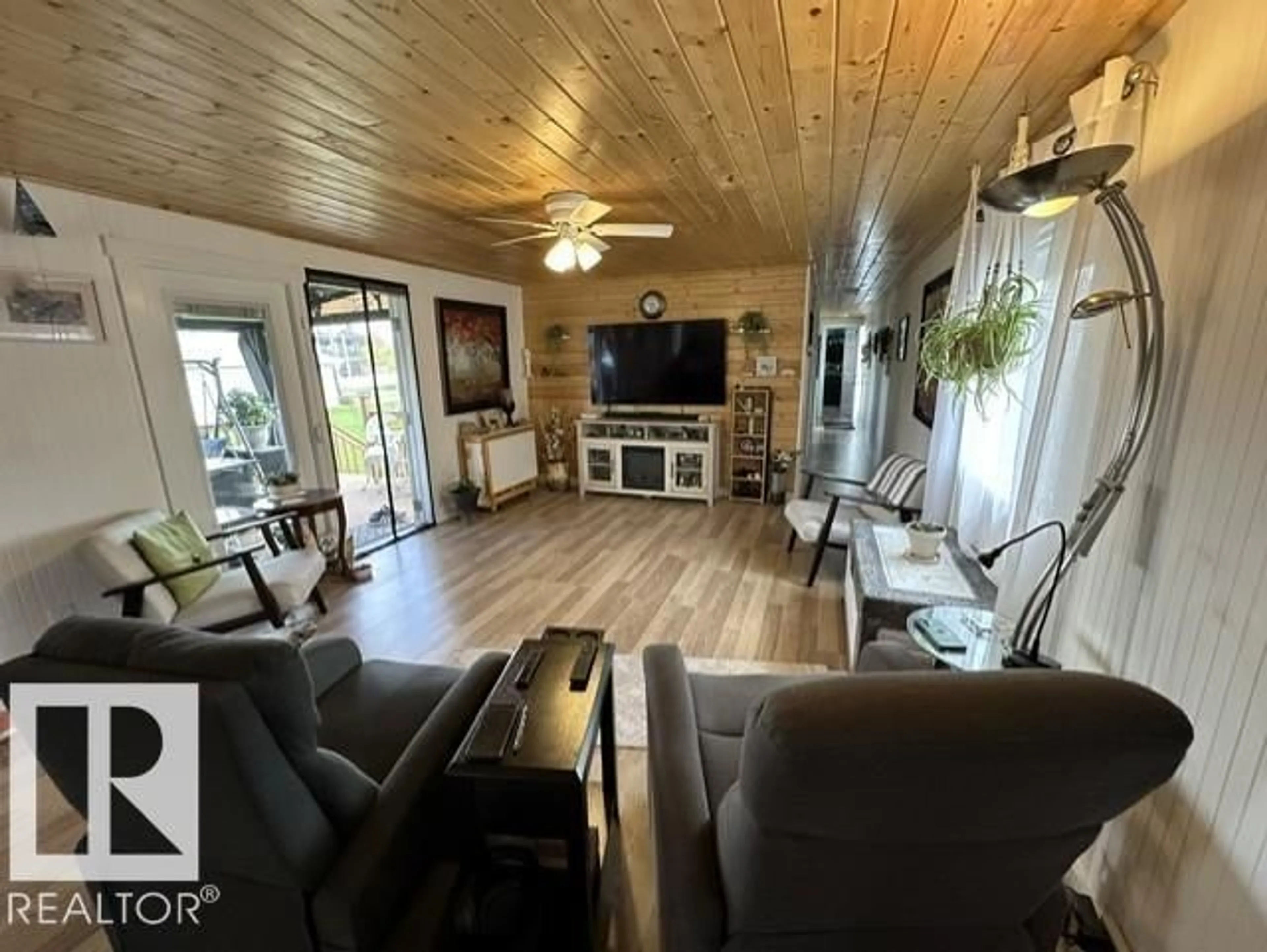 Living room with furniture, wood/laminate floor for 5013 53 AV, Wabamun Alberta T0E2K0
