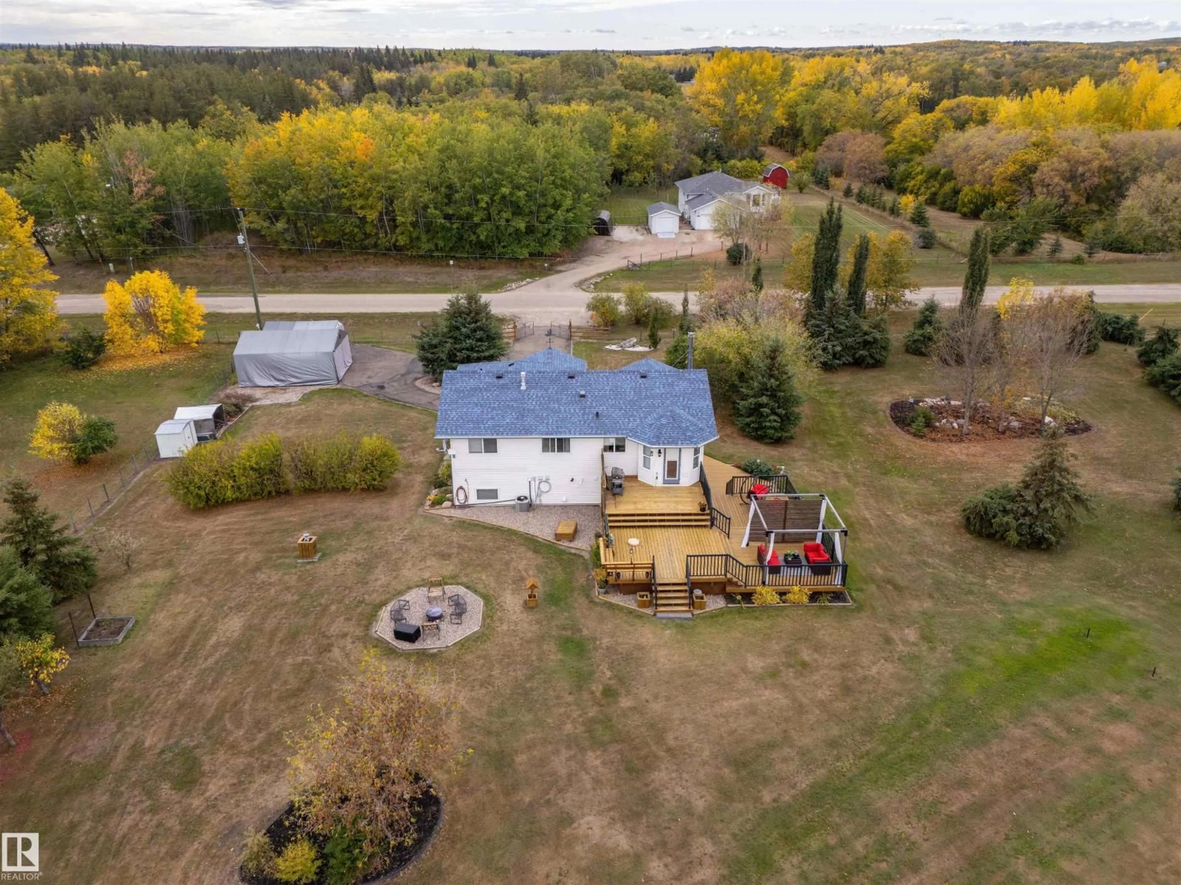 A pic from outside/outdoor area/front of a property/back of a property/a pic from drone, water/lake/river/ocean view for 5121 PINE DR, Cherry Grove Alberta T0A0T0