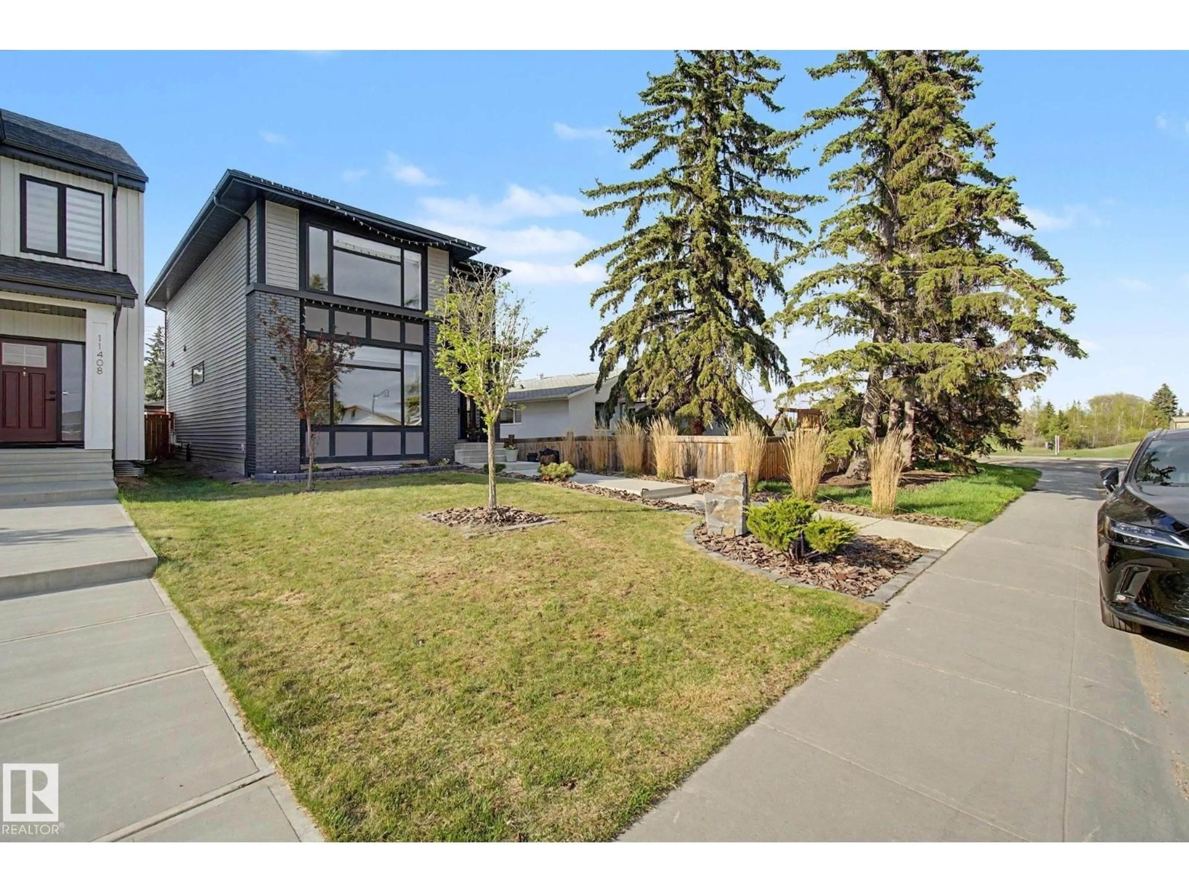 Home with brick exterior material, street for 11406 55 AV, Edmonton Alberta T6H0X4