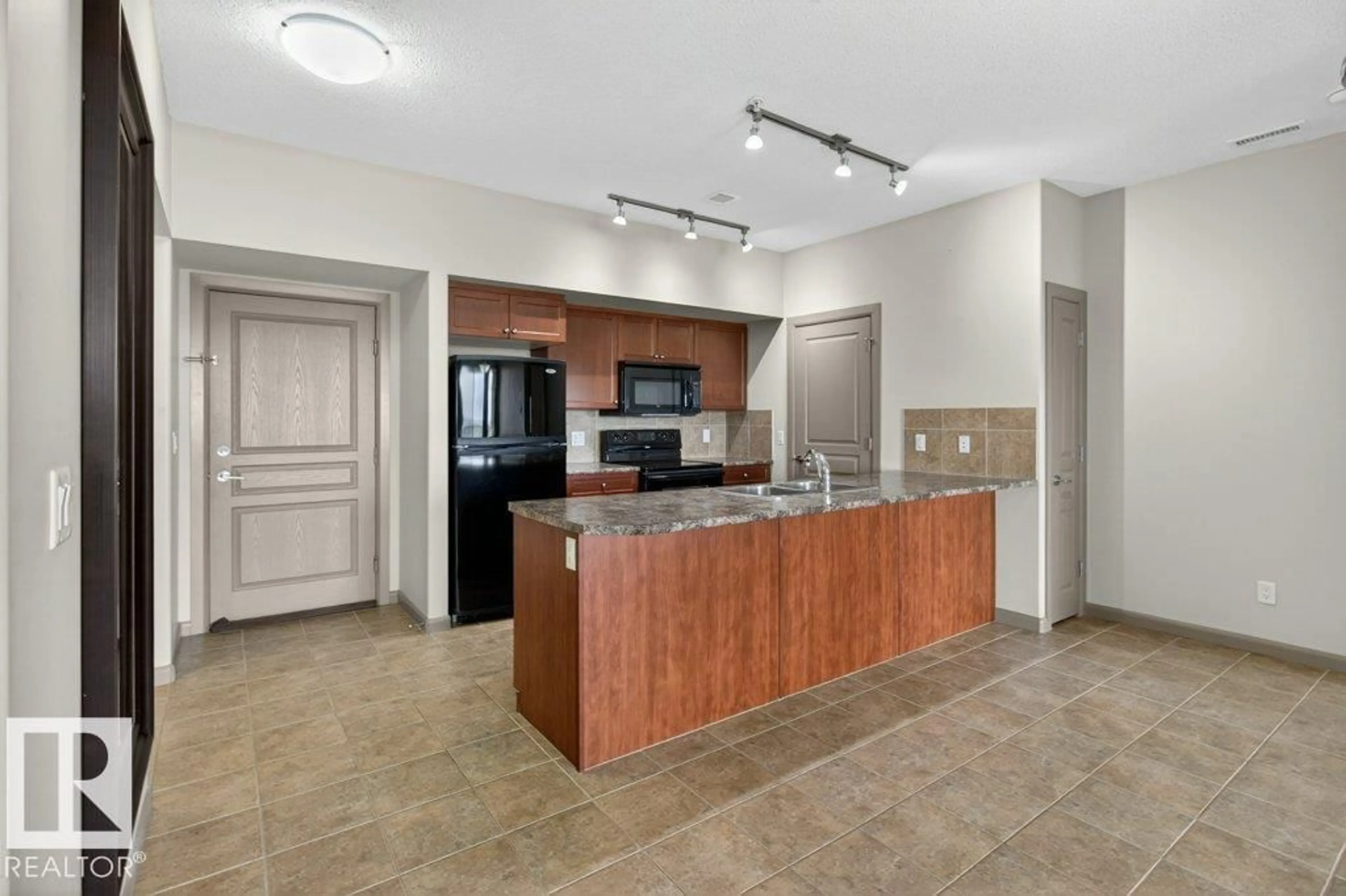 Open concept kitchen, ceramic/tile floor for 500 - 419 PALISADES WAY, Sherwood Park Alberta T8H0H7