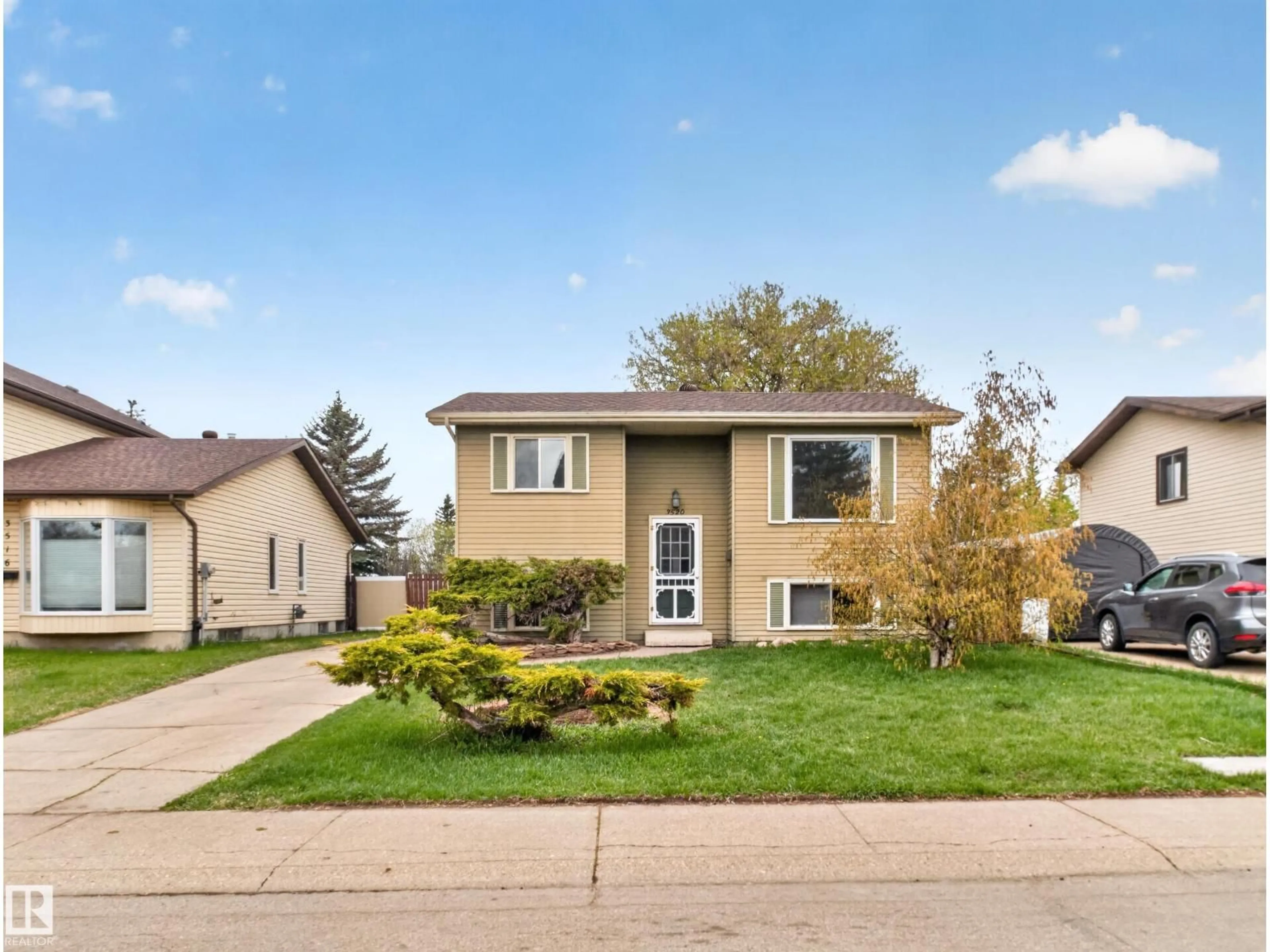 Home with vinyl exterior material, street for 3520 49A STREET, Edmonton Alberta T6L3V9