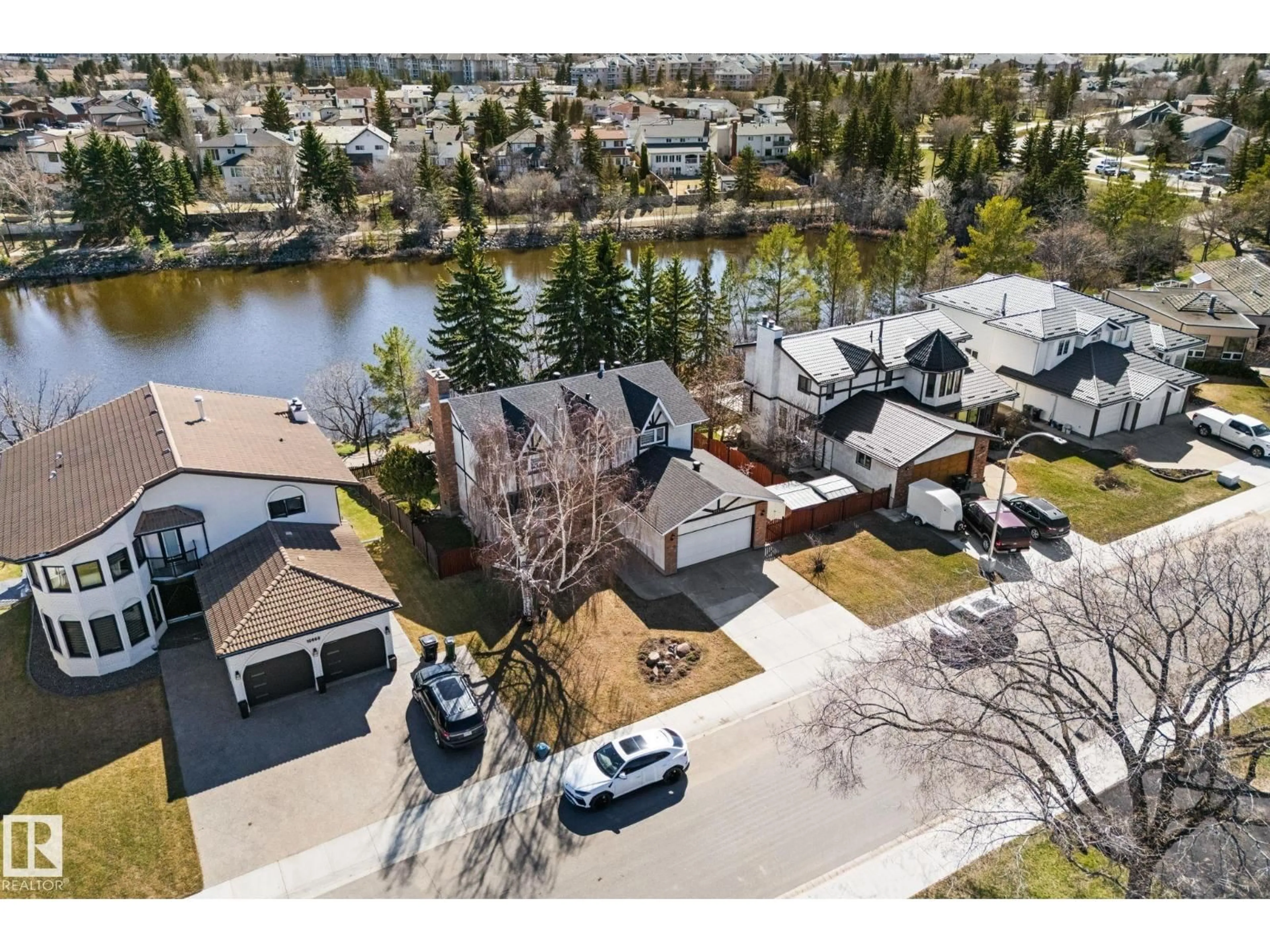 A pic from outside/outdoor area/front of a property/back of a property/a pic from drone, water/lake/river/ocean view for 10673 161 AV, Edmonton Alberta T5X4Z9