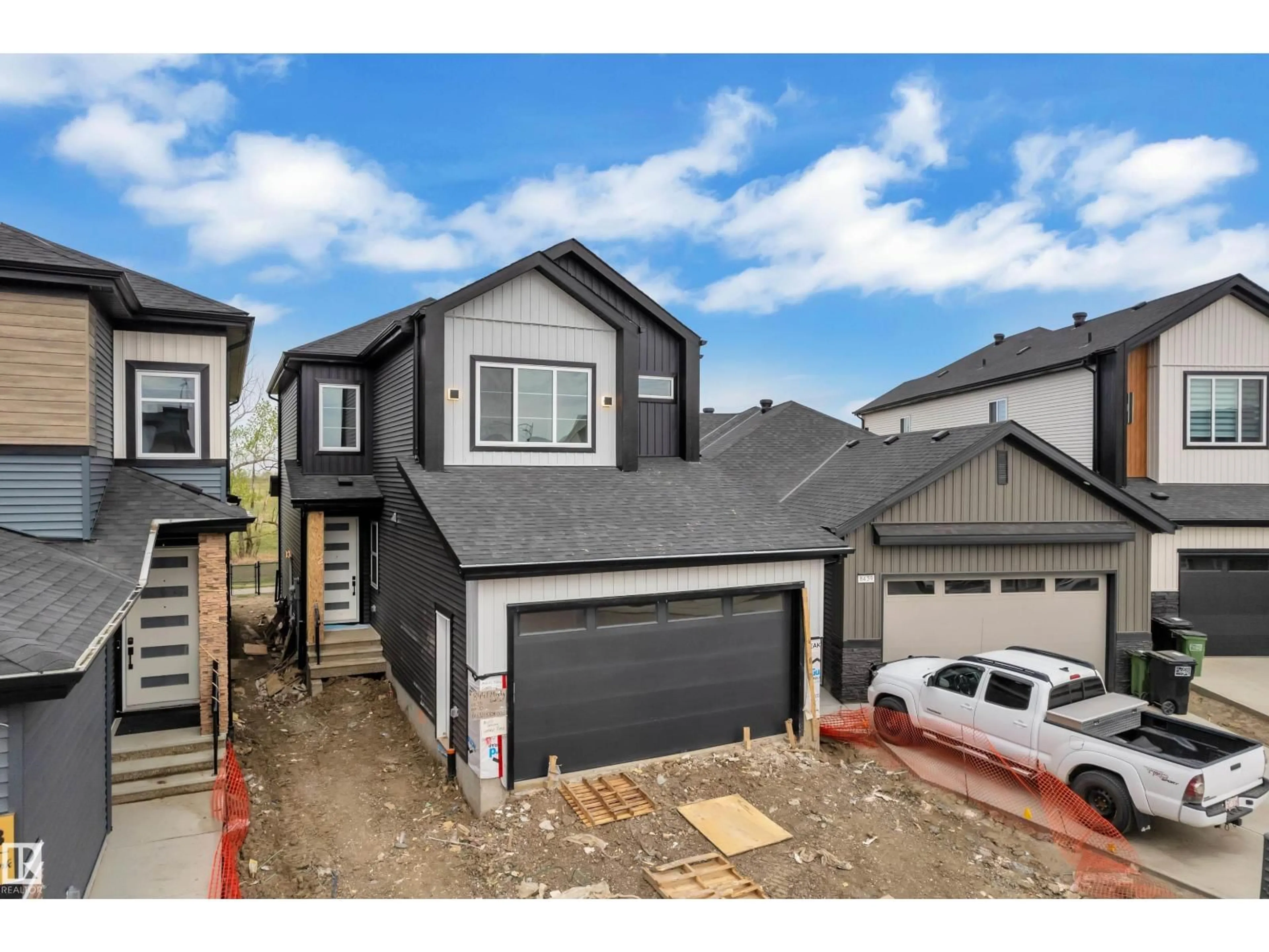 Home with vinyl exterior material, street for 8441 MAYDAY LINK SW, Edmonton Alberta T6X3E6