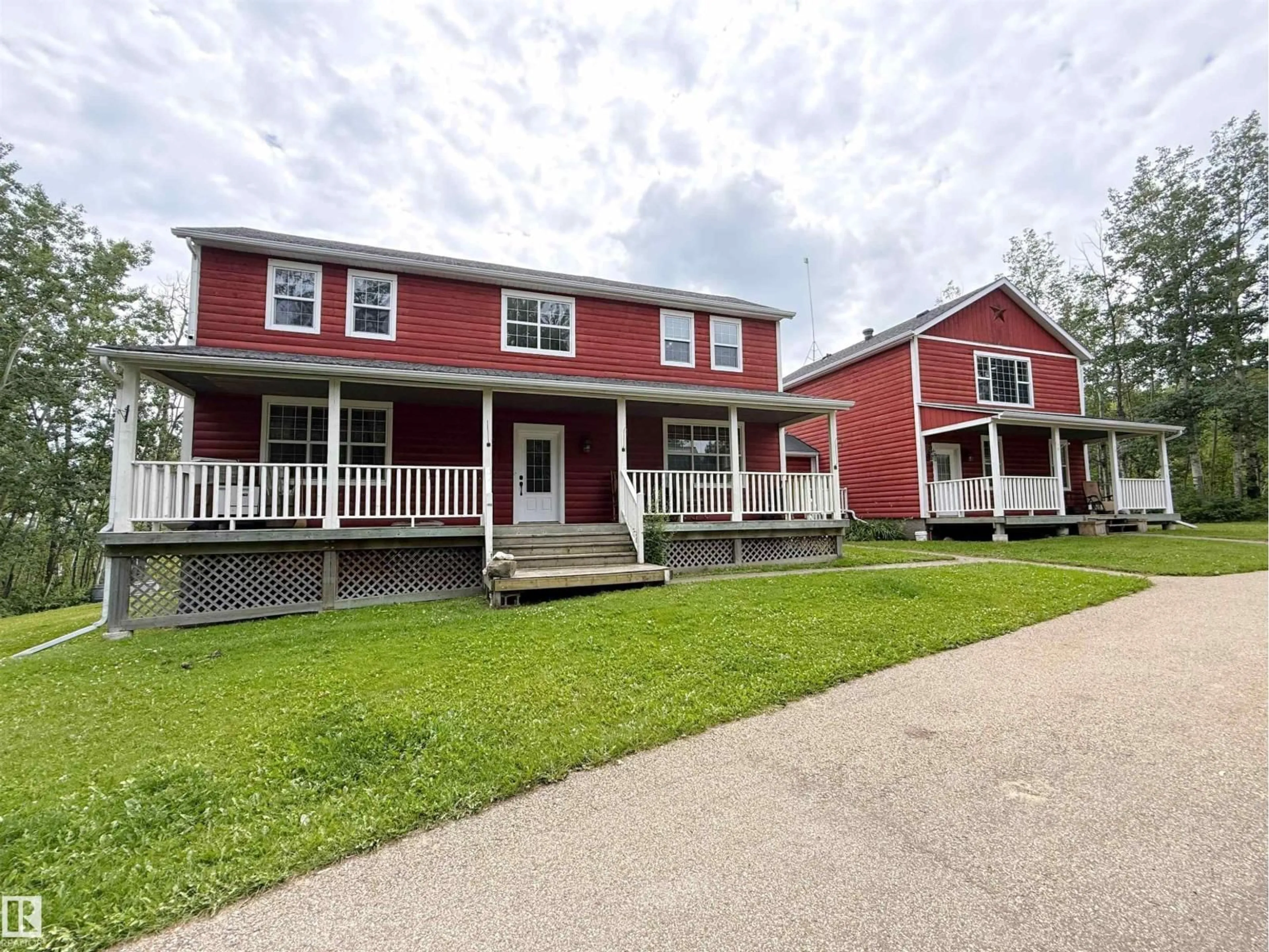 Home with vinyl exterior material, street for 2544 HWY 770, Rural Leduc County Alberta T0C2T0