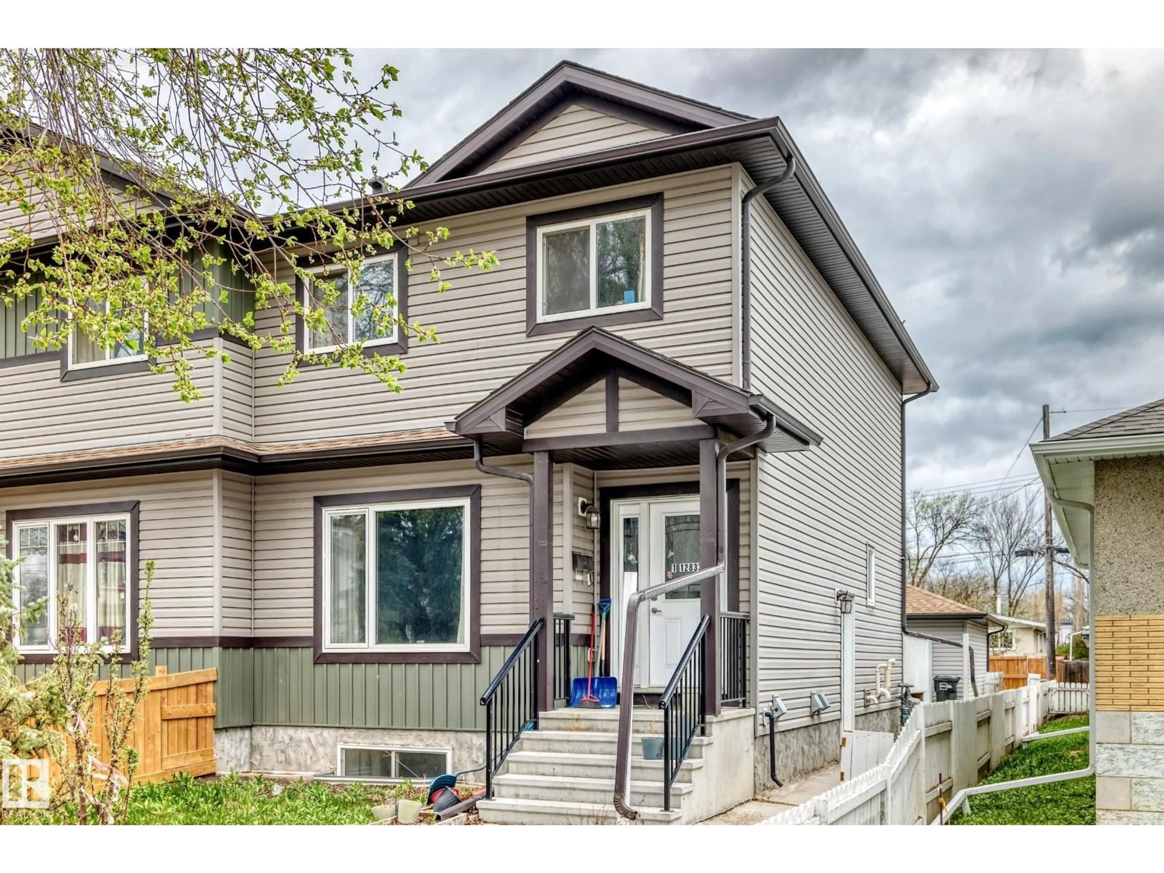 Home with vinyl exterior material, street for NW - 12833 123 ST, Edmonton Alberta T5L0J4