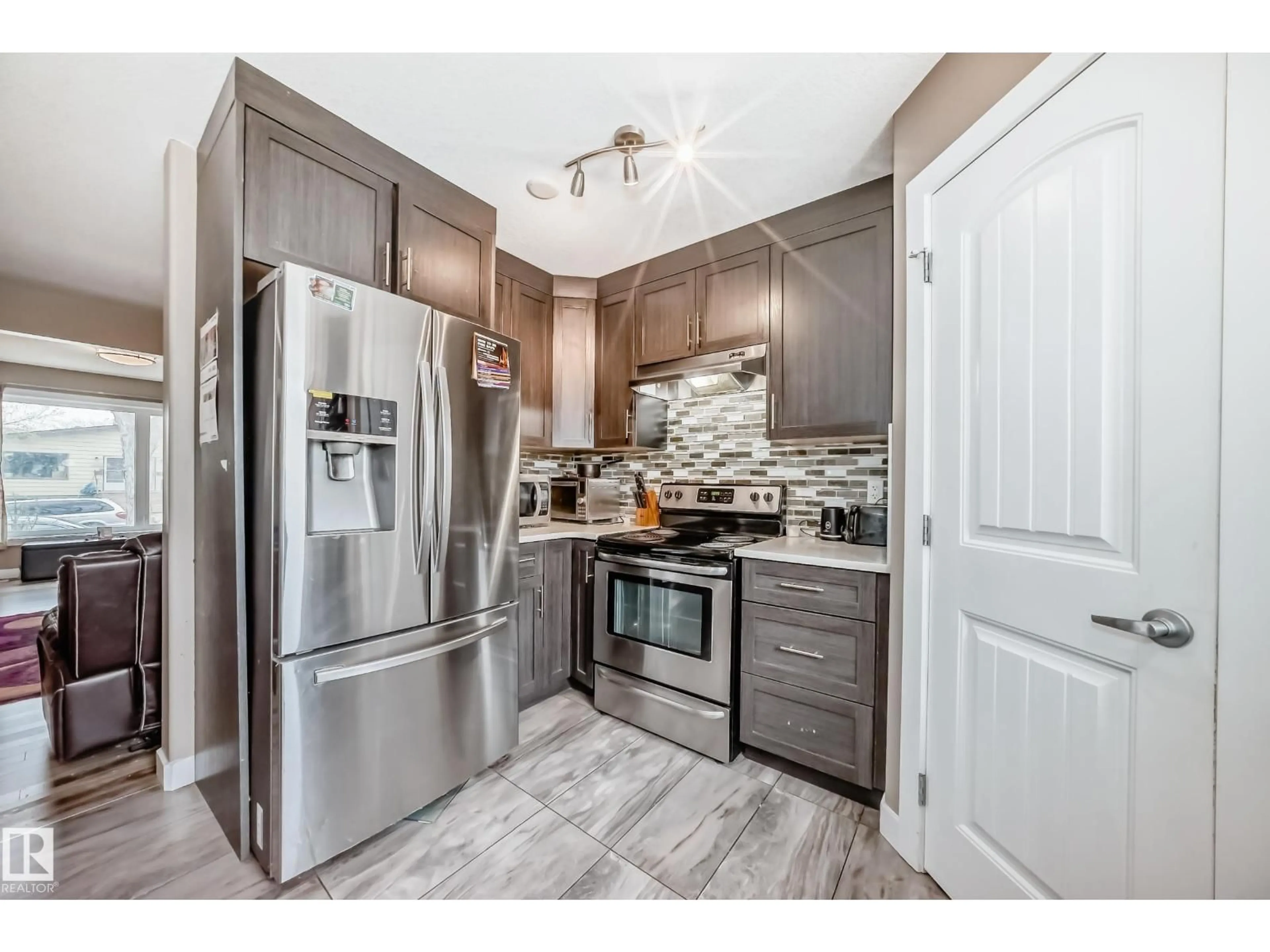 Open concept kitchen, unknown for NW - 12833 123 ST, Edmonton Alberta T5L0J4