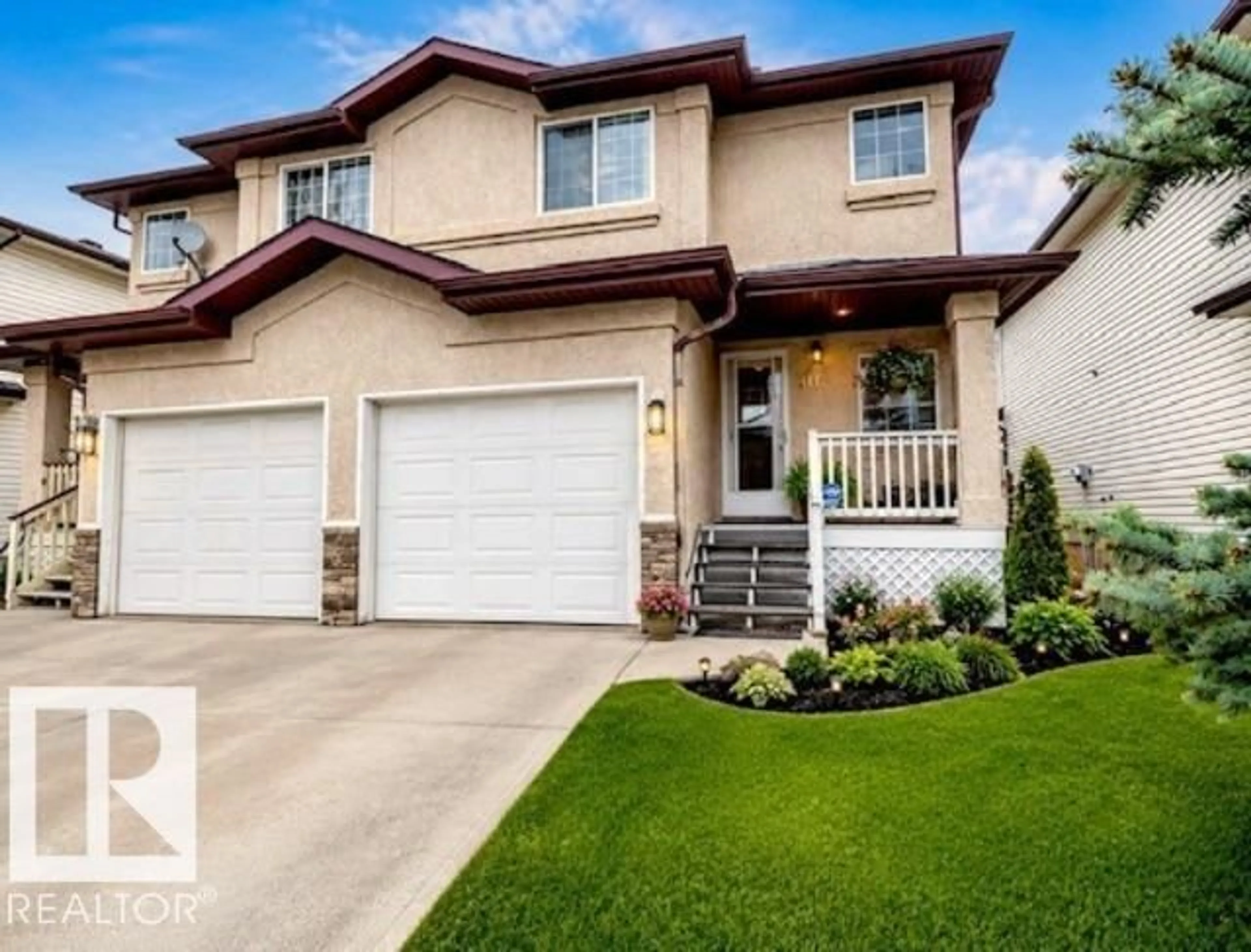 Home with vinyl exterior material, street for NW - 9112 166 AV, Edmonton Alberta T5Z3H5