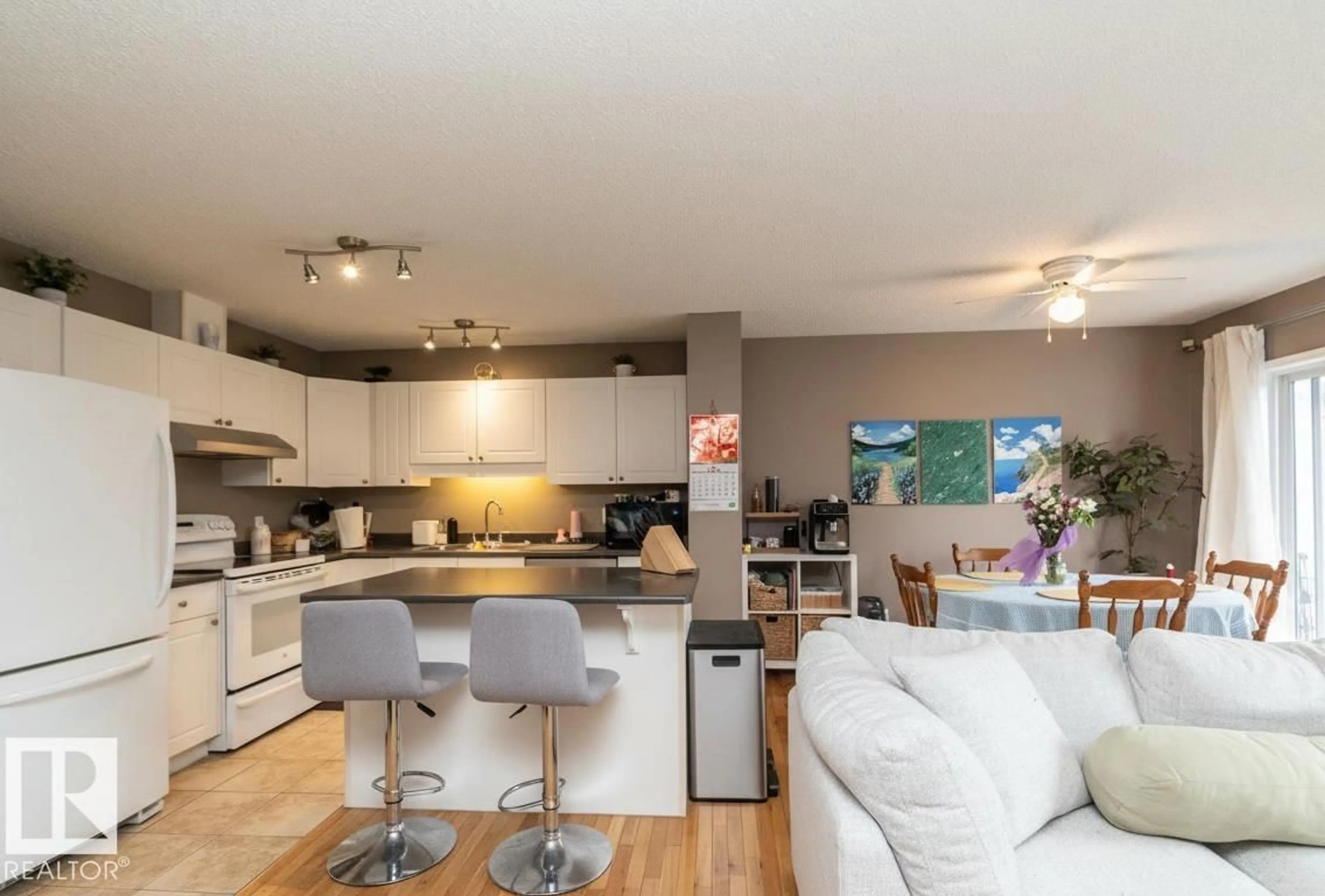 Open concept kitchen, wood/laminate floor for NW - 9112 166 AV, Edmonton Alberta T5Z3H5