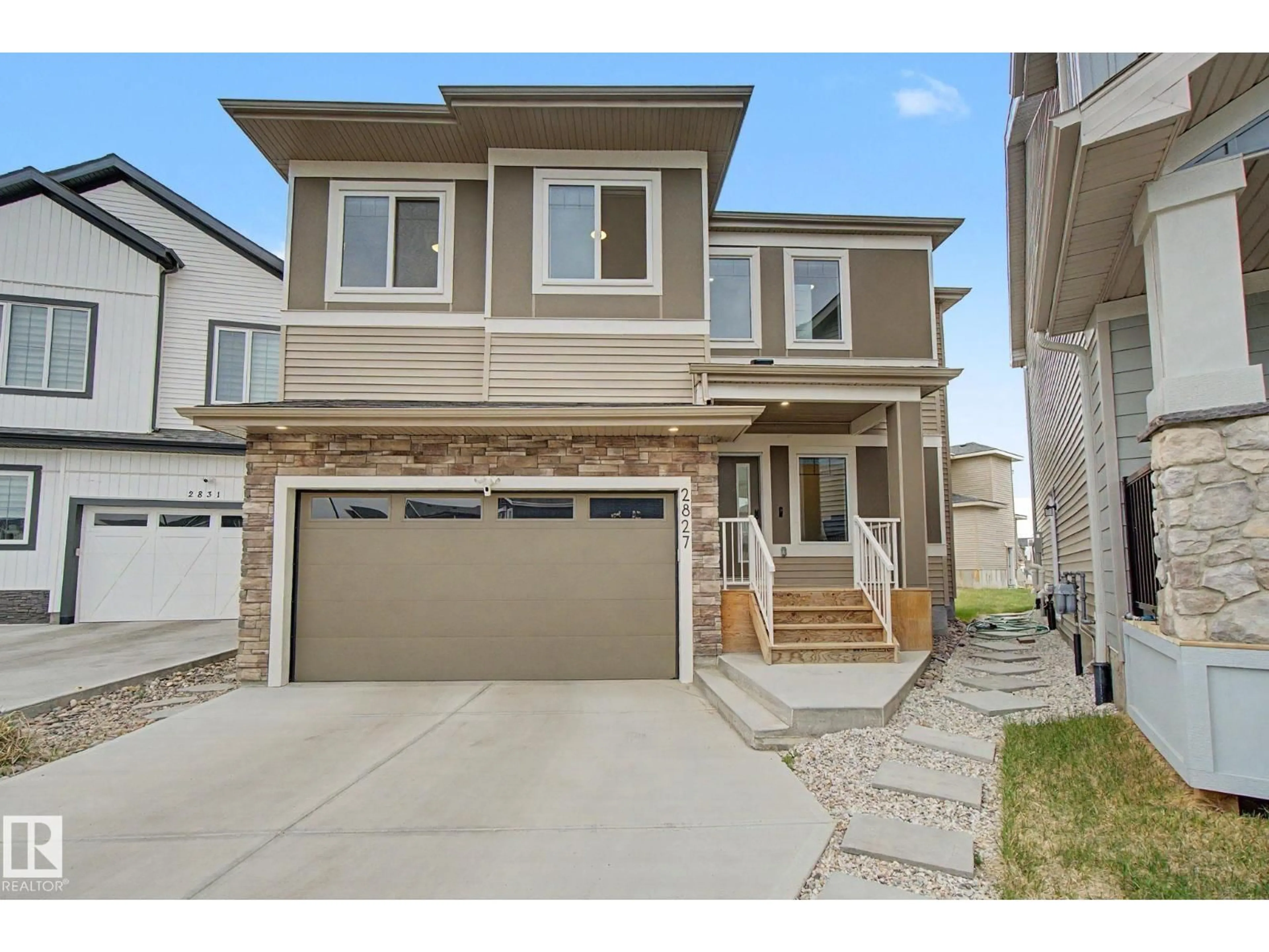 Home with vinyl exterior material, street for NW - 2827 196 ST, Edmonton Alberta T6M1M2
