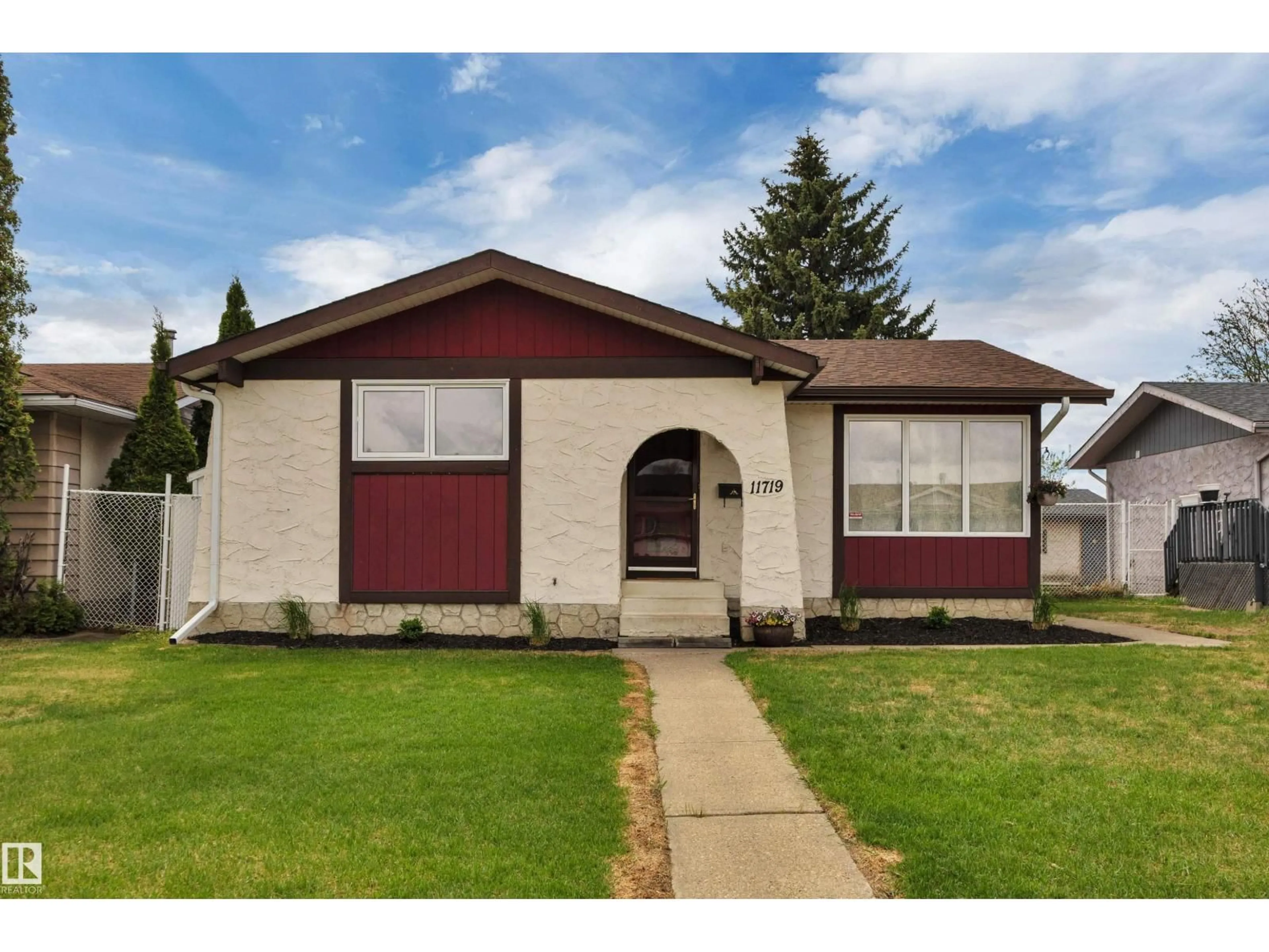 Home with vinyl exterior material, street for 11719 152A AV, Edmonton Alberta T5X1E5