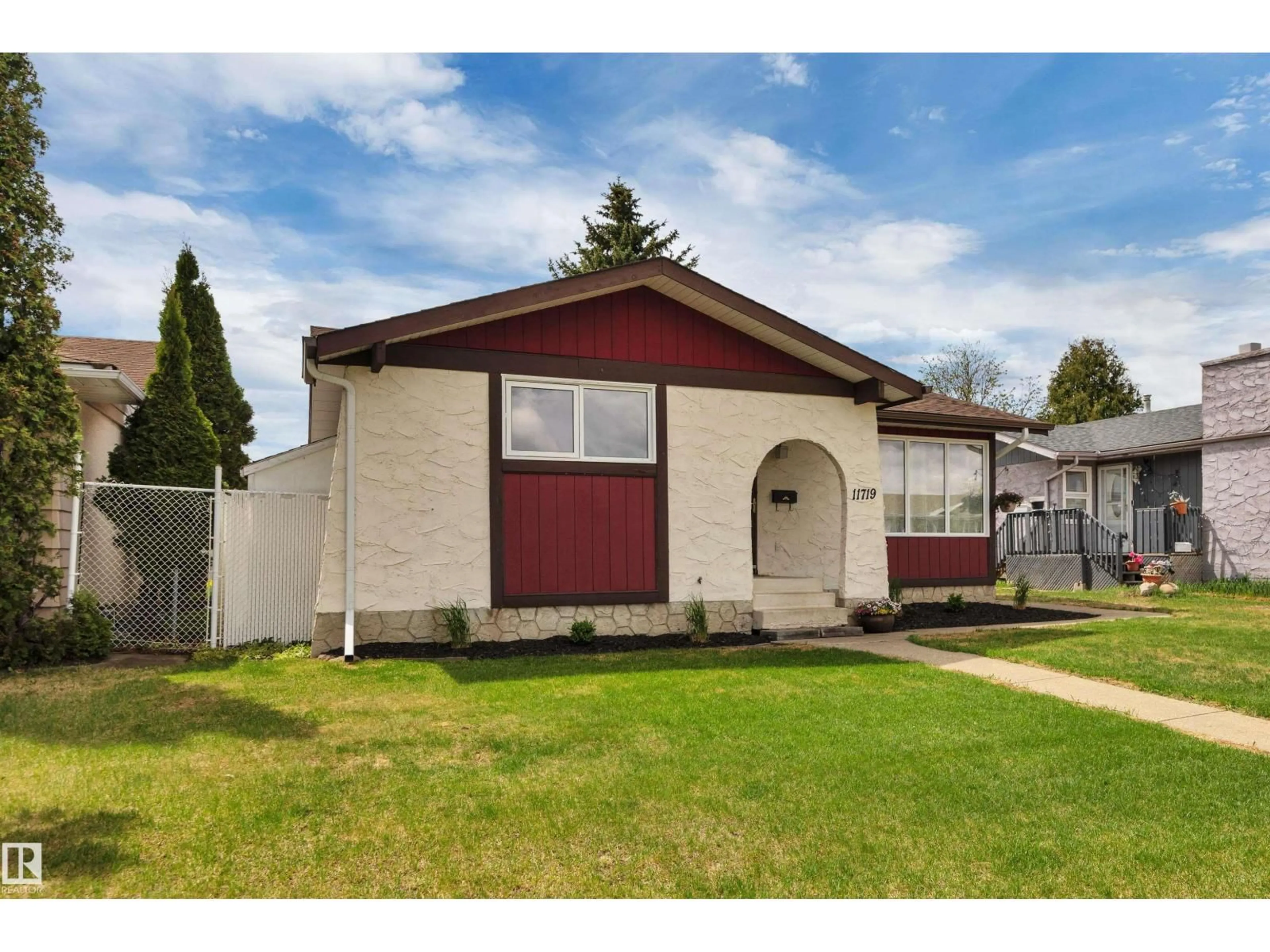 Home with vinyl exterior material, street for 11719 152A AV, Edmonton Alberta T5X1E5
