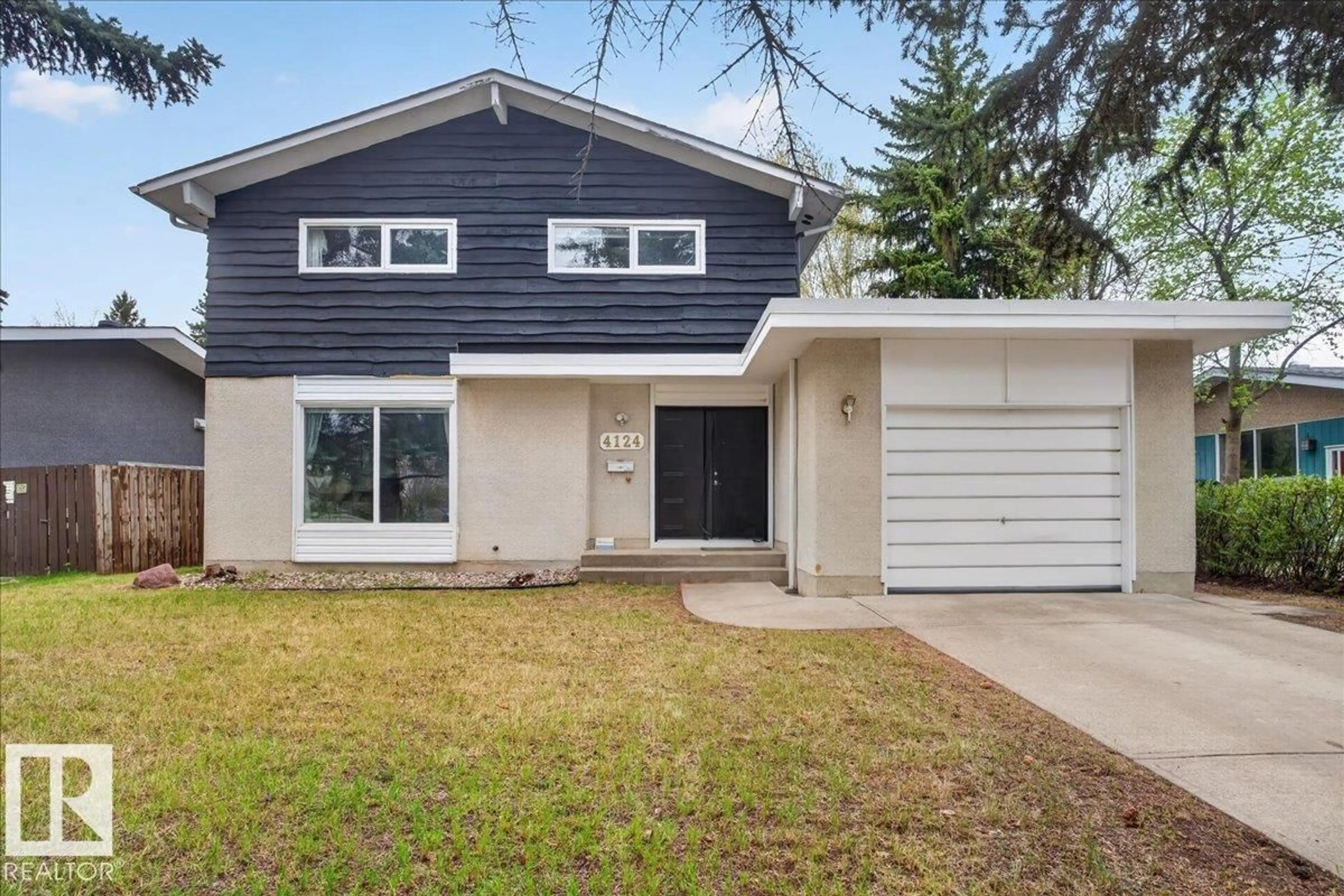 Home with vinyl exterior material, street for NW - 4124 121 ST, Edmonton Alberta T6J1Y5