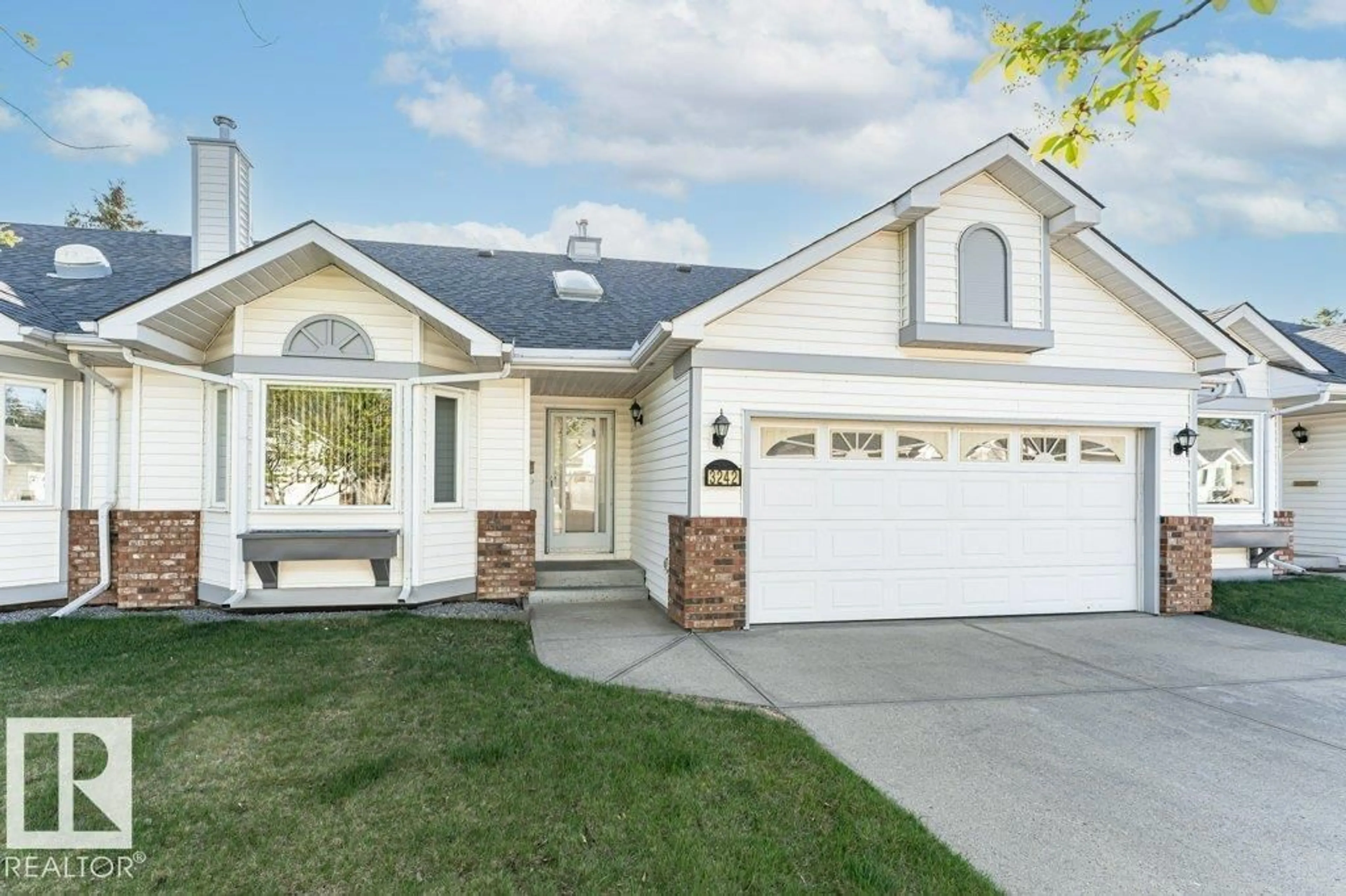 Home with vinyl exterior material, street for NW - 3242 38 AV, Edmonton Alberta T6T1J3