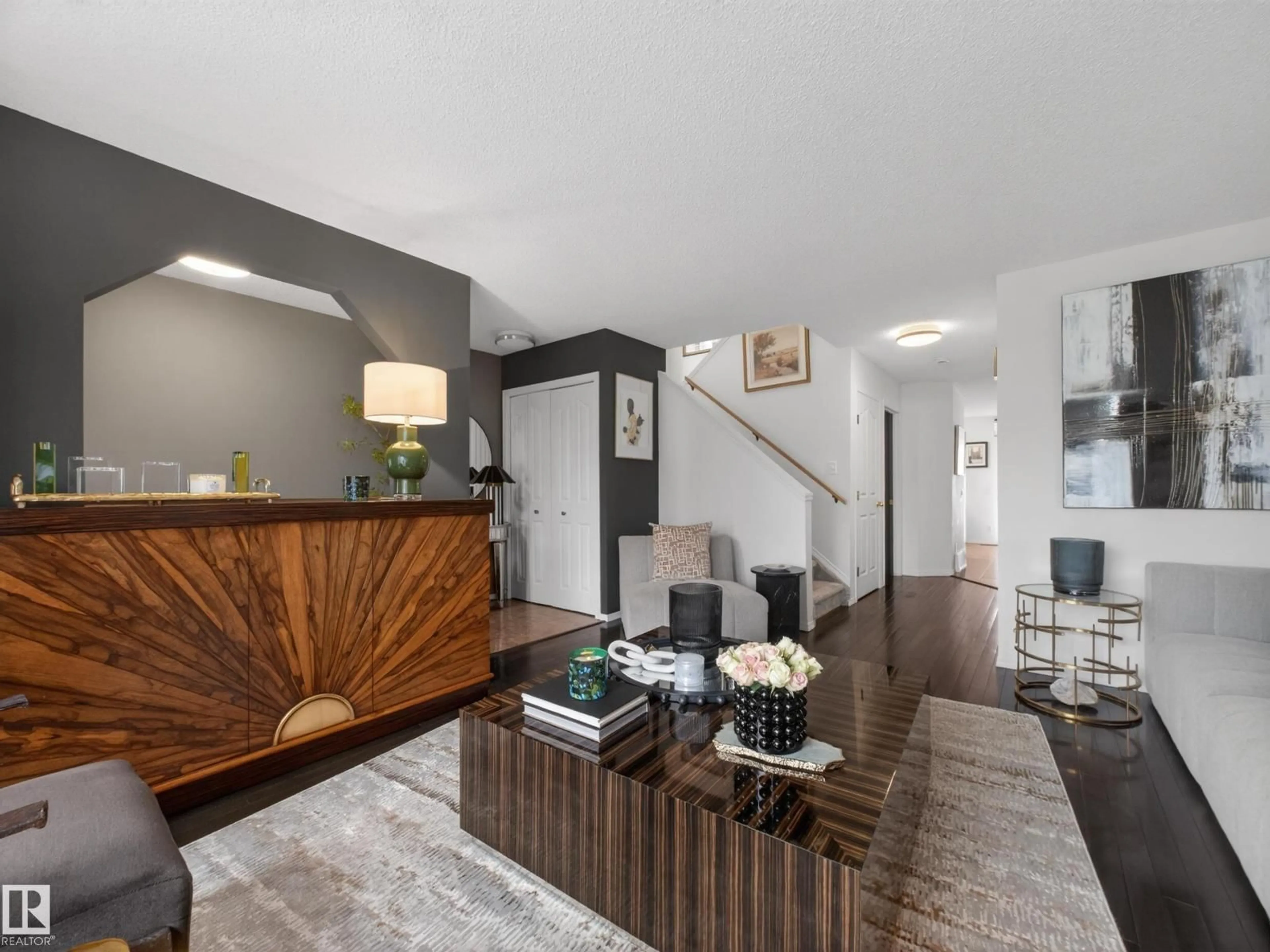 Living room with furniture, wood/laminate floor for 7211 78 AVE, Edmonton Alberta T6B0B8
