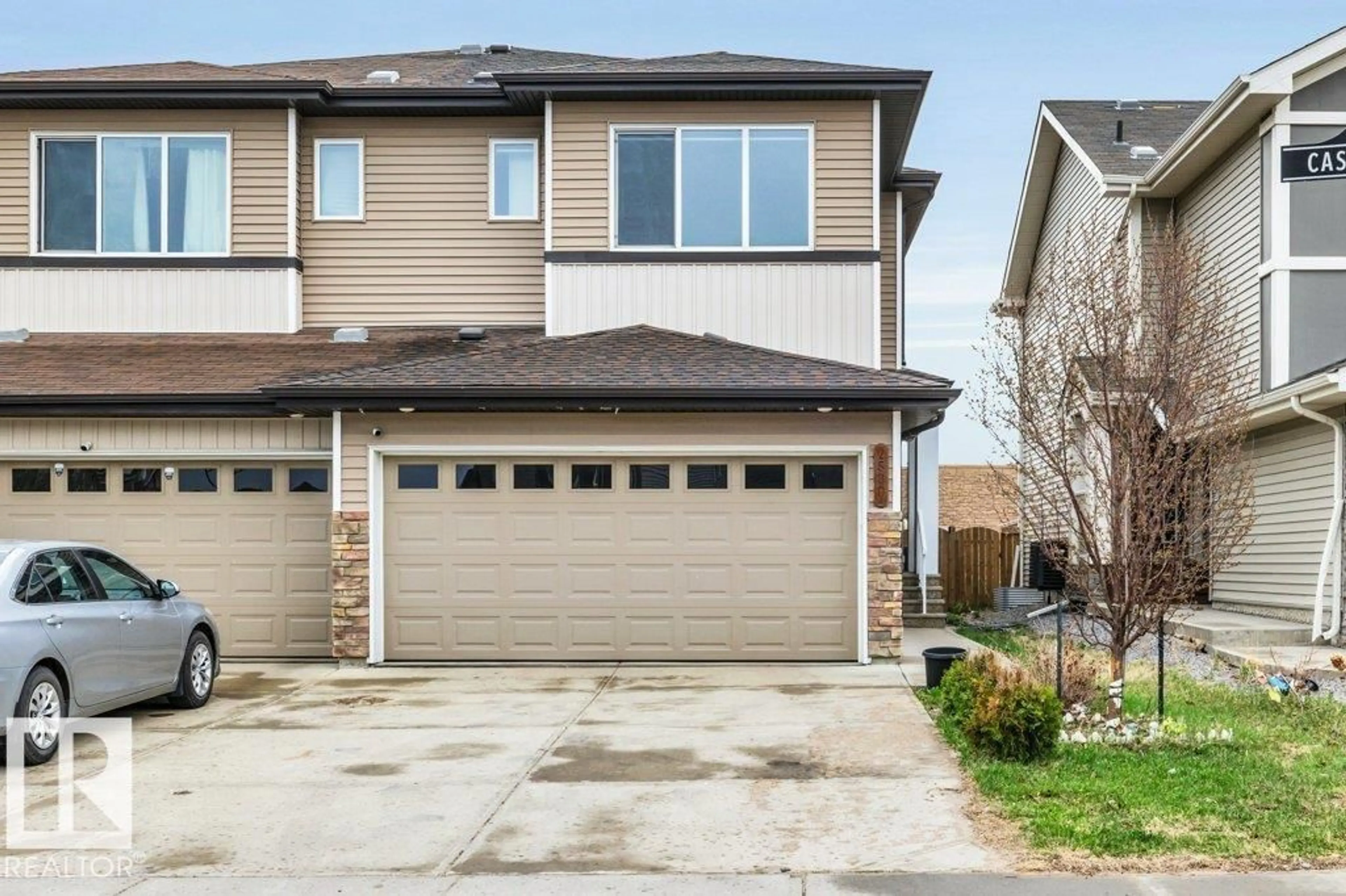 Home with vinyl exterior material, street for 2580 CASEY WY, Edmonton Alberta T6W3N2