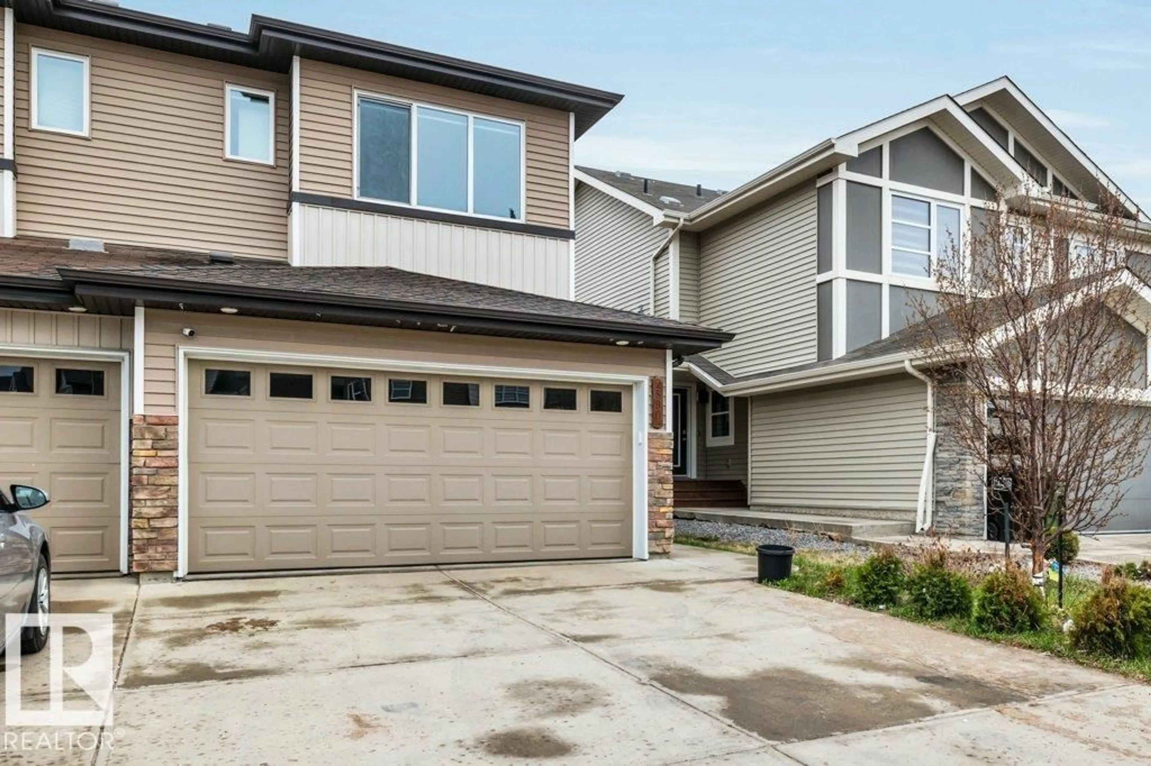 Home with vinyl exterior material, street for 2580 CASEY WY, Edmonton Alberta T6W3N2