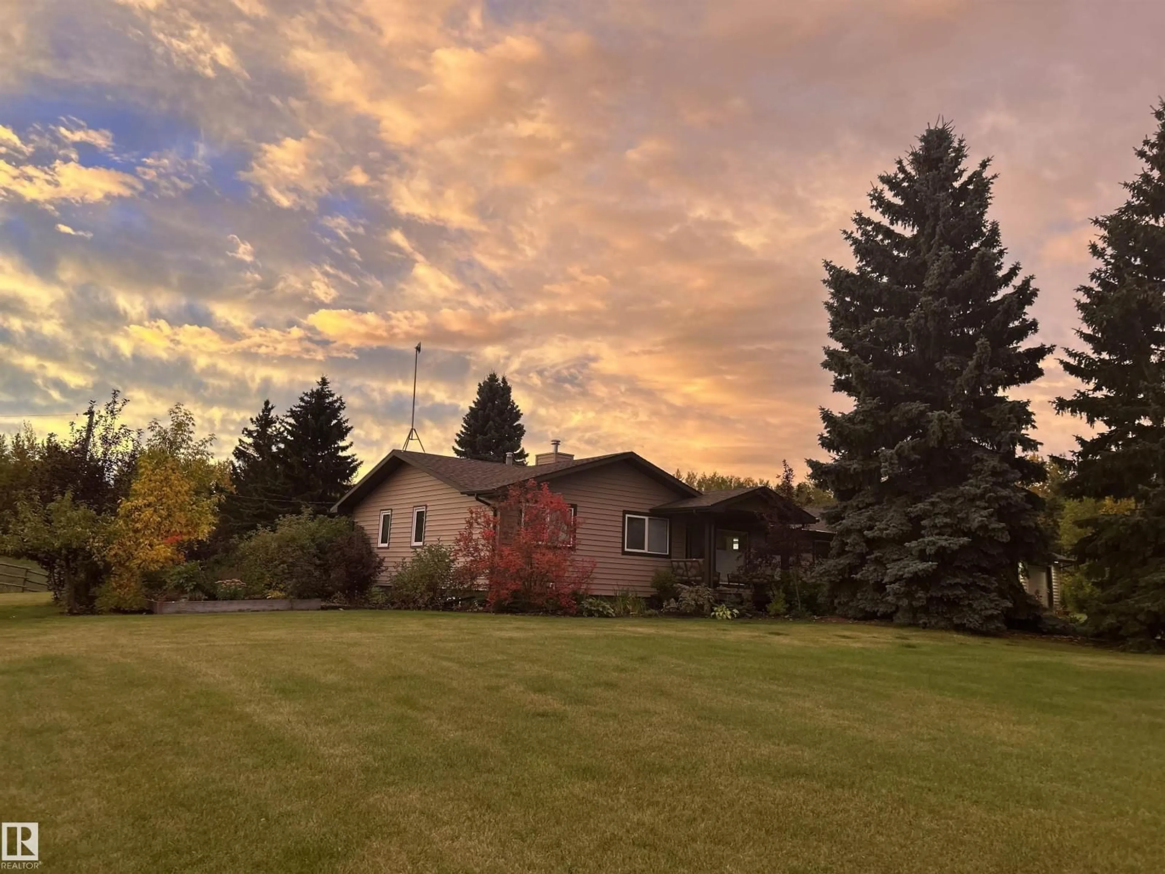 A pic from outside/outdoor area/front of a property/back of a property/a pic from drone, mountain view for 22245 TWP ROAD 512, Rural Strathcona County Alberta T8C1H2