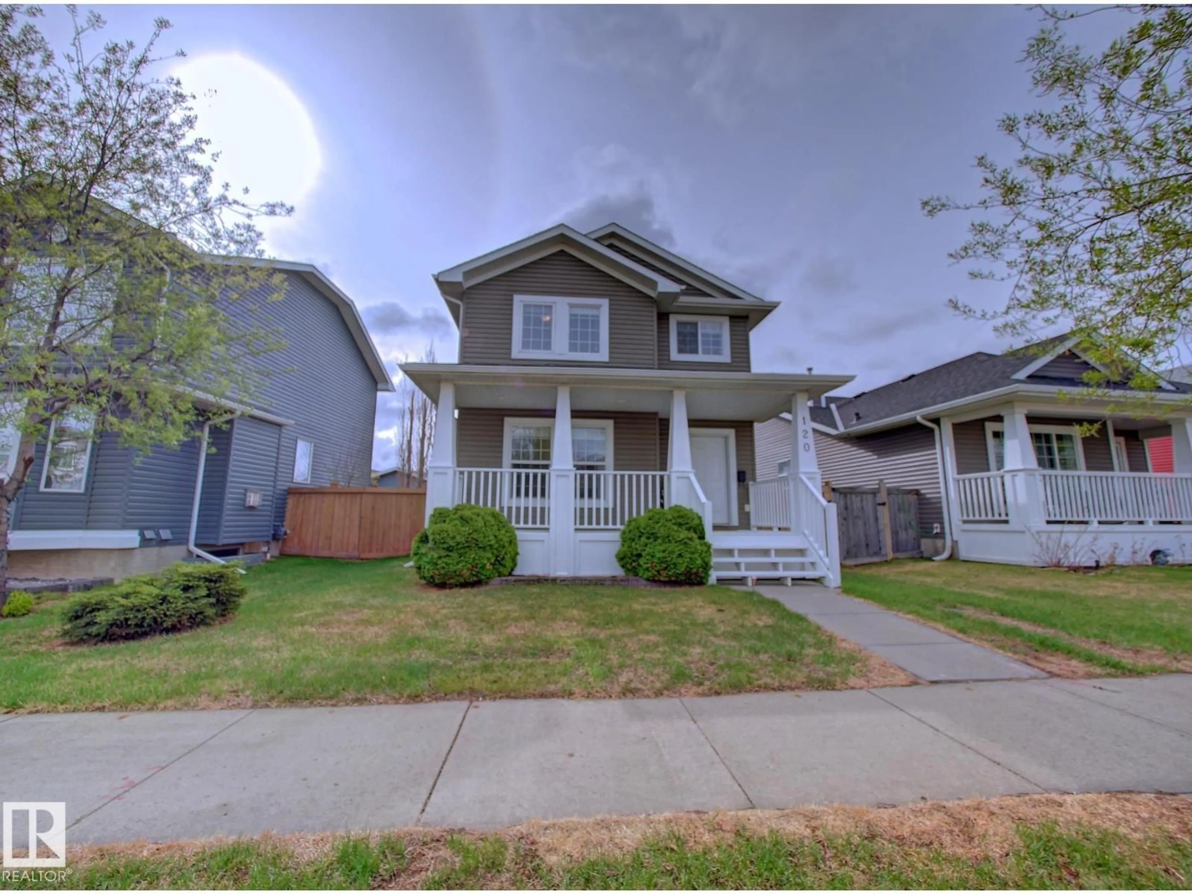Home with vinyl exterior material, street for 120 WESTWOOD LN, Fort Saskatchewan Alberta T8L4N8