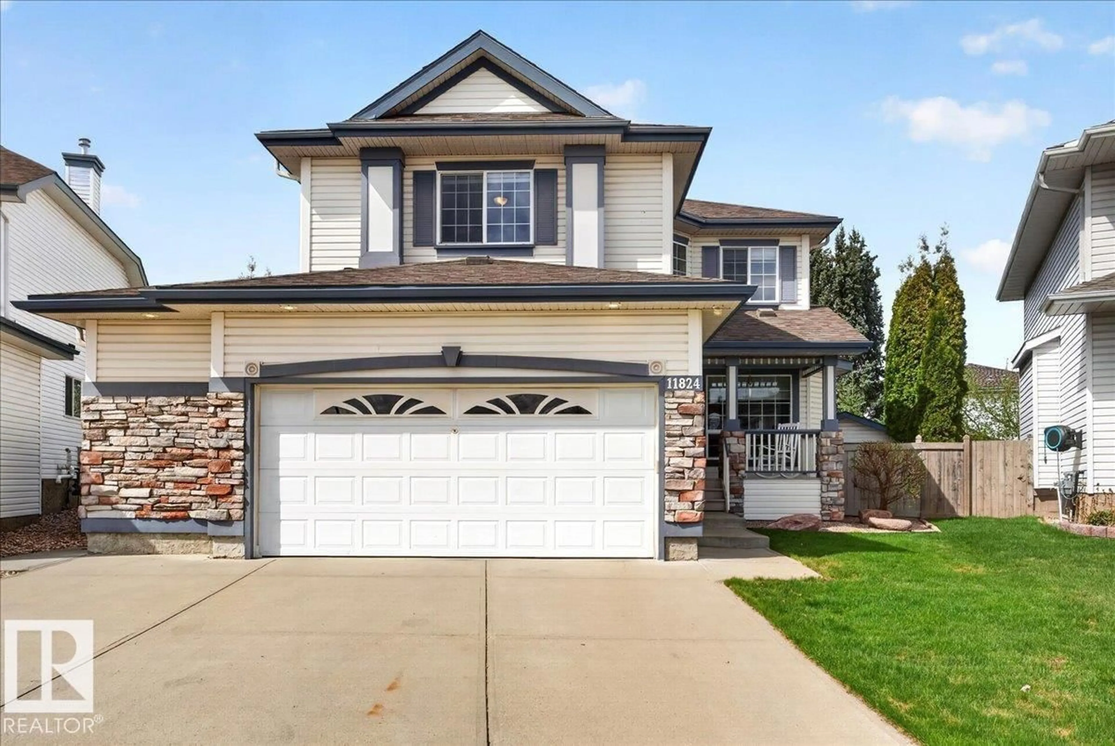 Home with vinyl exterior material, street for 11824 13 AV, Edmonton Alberta T6J7E9