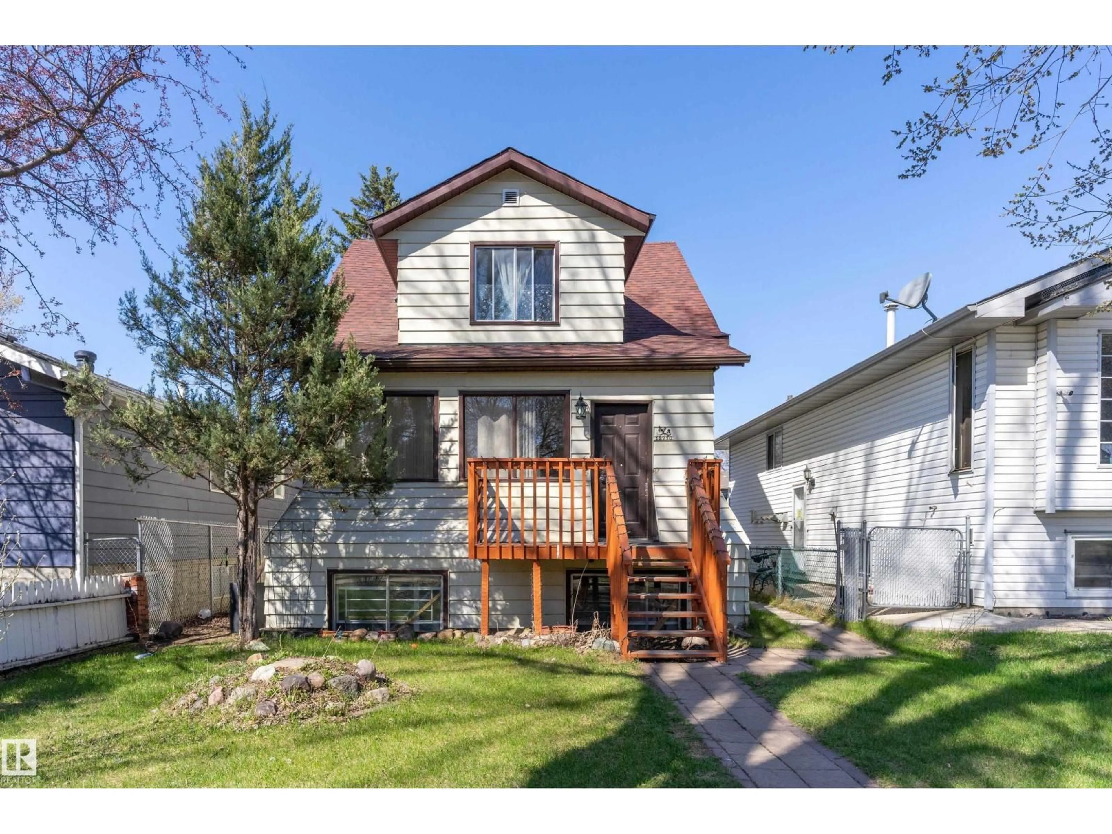 Home with vinyl exterior material, street for 12770 117 ST, Edmonton Alberta T5E5J5
