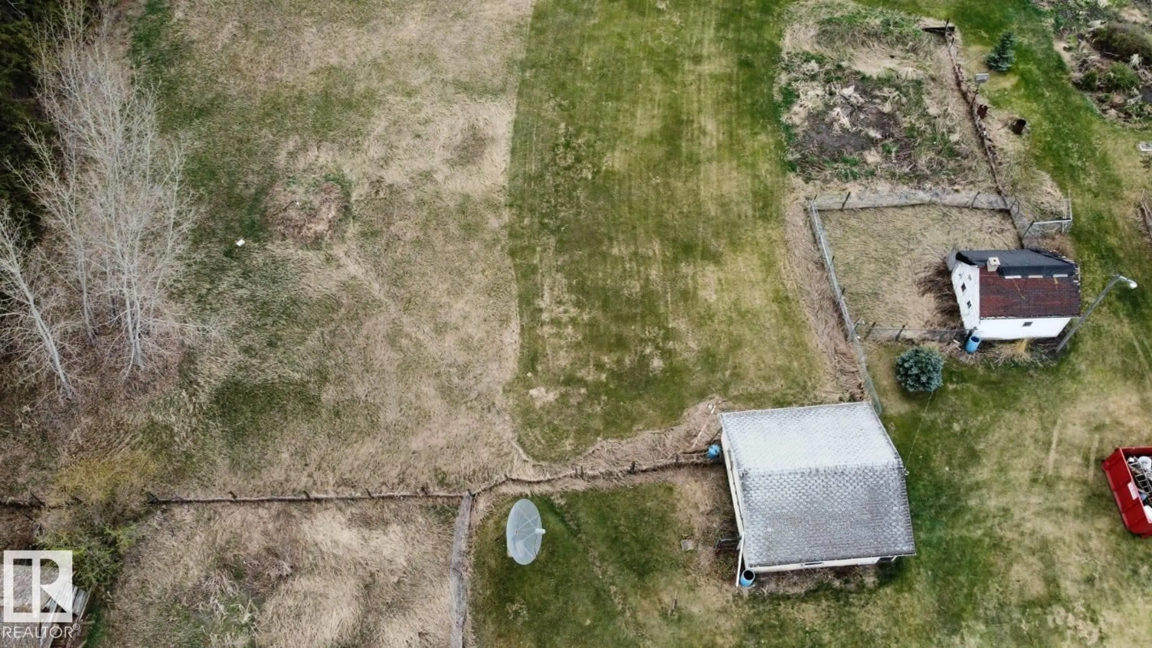 A pic from outside/outdoor area/front of a property/back of a property/a pic from drone, building for 55117 RR 233, Rural Sturgeon County Alberta T8T2B2