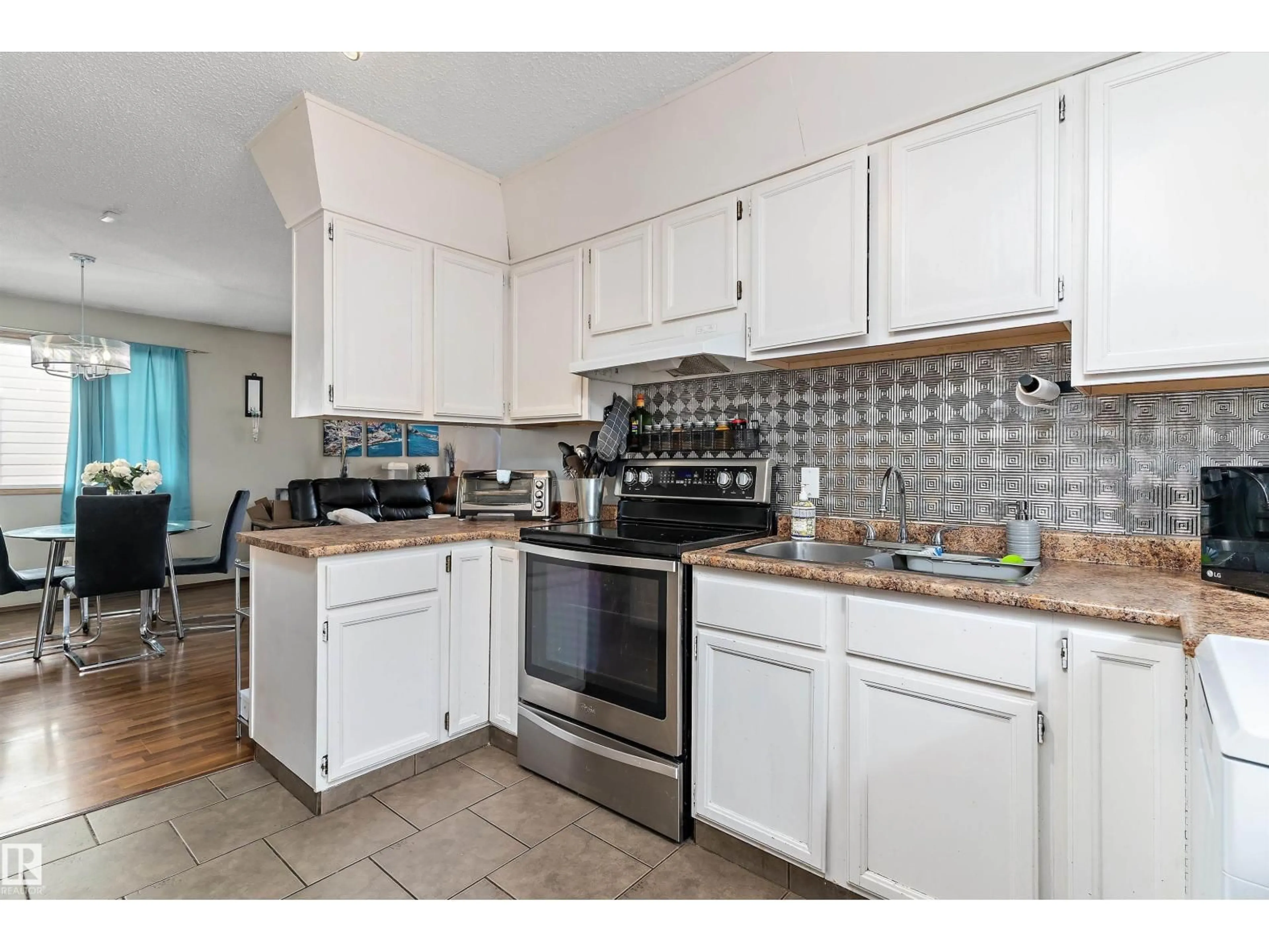 Standard kitchen, ceramic/tile floor for NW - 12914 69 ST, Edmonton Alberta T5C0H2